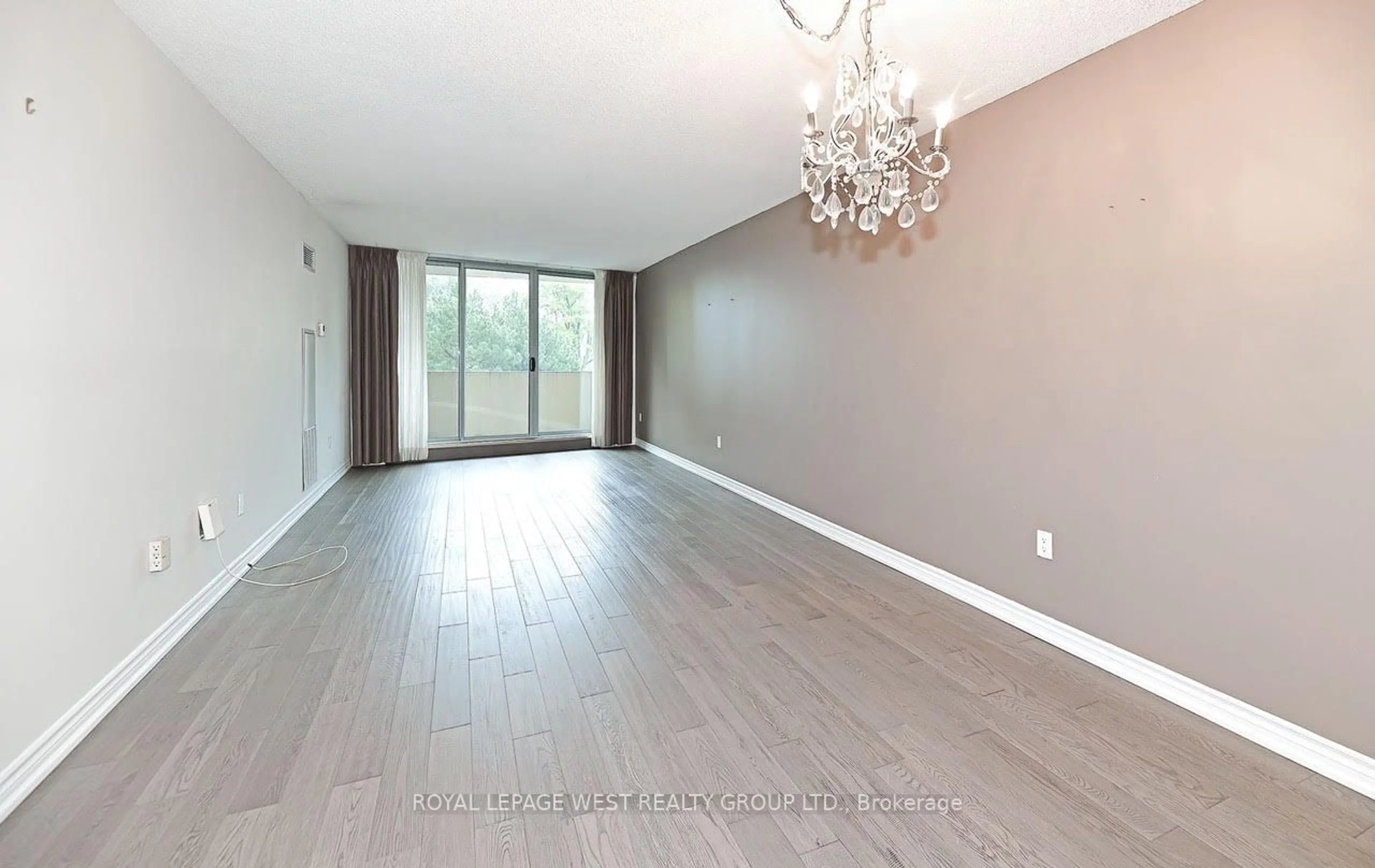 A pic of a room, wood floors for 299 Mill Rd #205, Toronto Ontario M9C 4V9