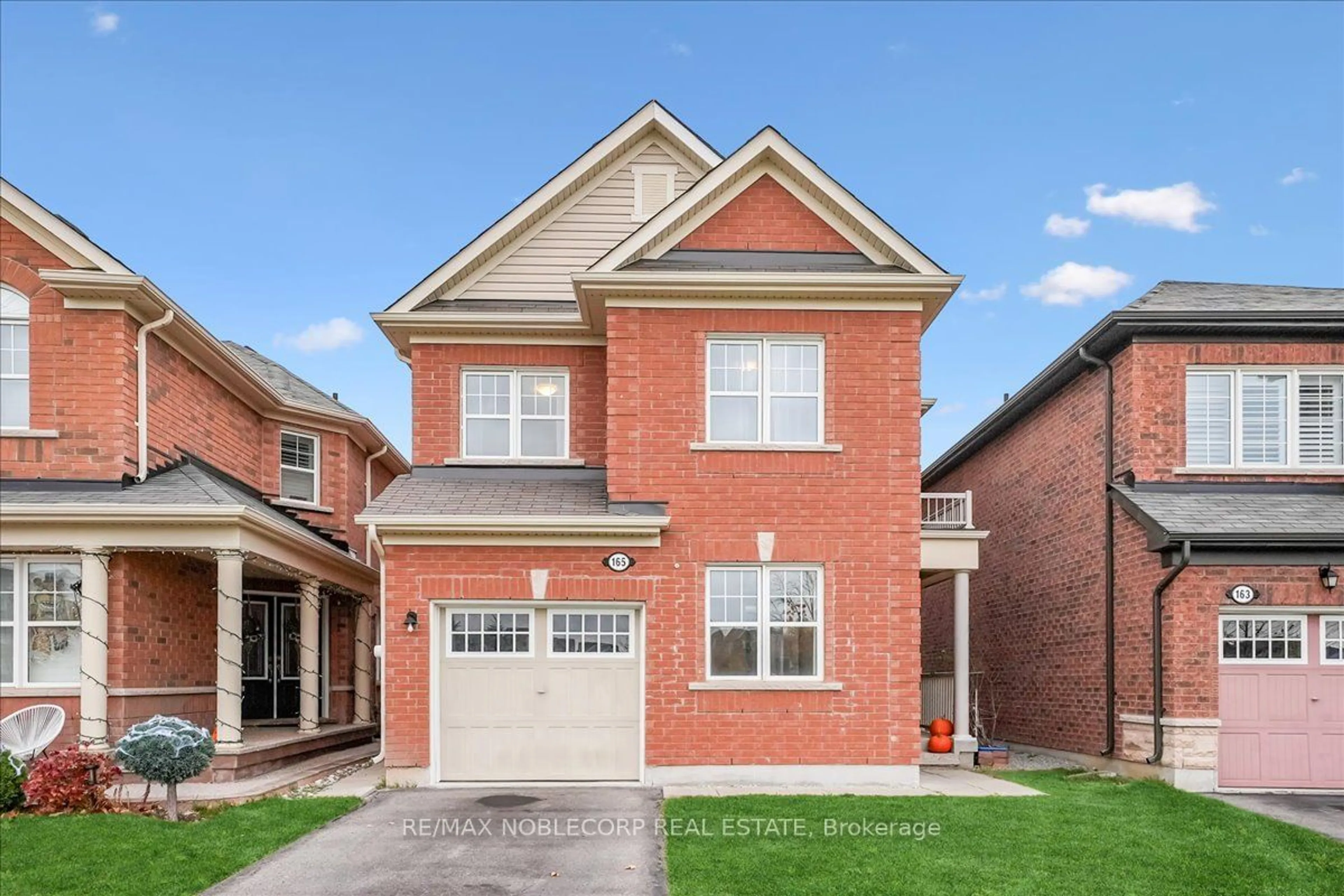 Home with brick exterior material for 165 Robert Parkinson Dr, Brampton Ontario L7A 4H6