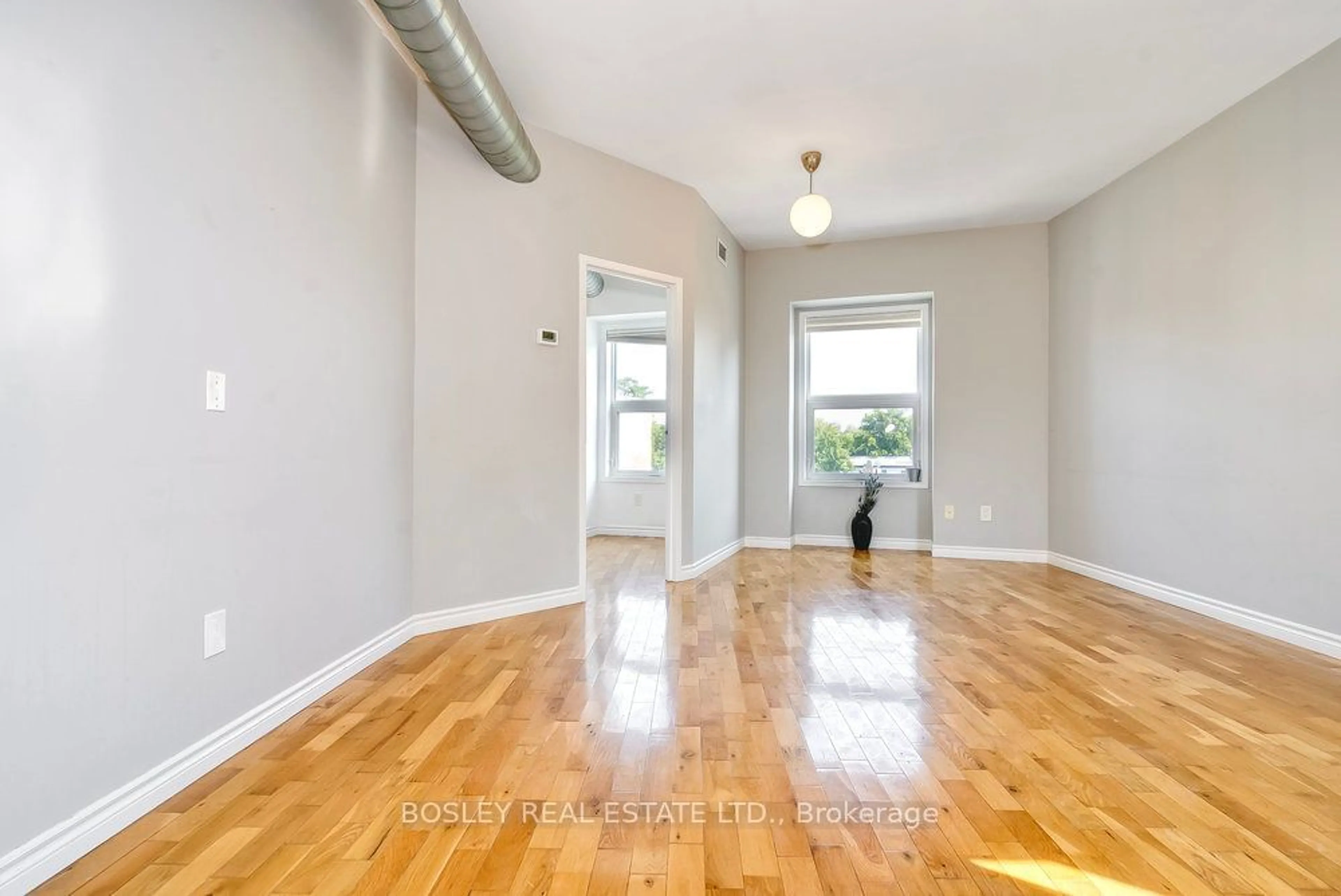 A pic of a room, wood floors for 2909 Dundas St, Toronto Ontario M6P 1Z1