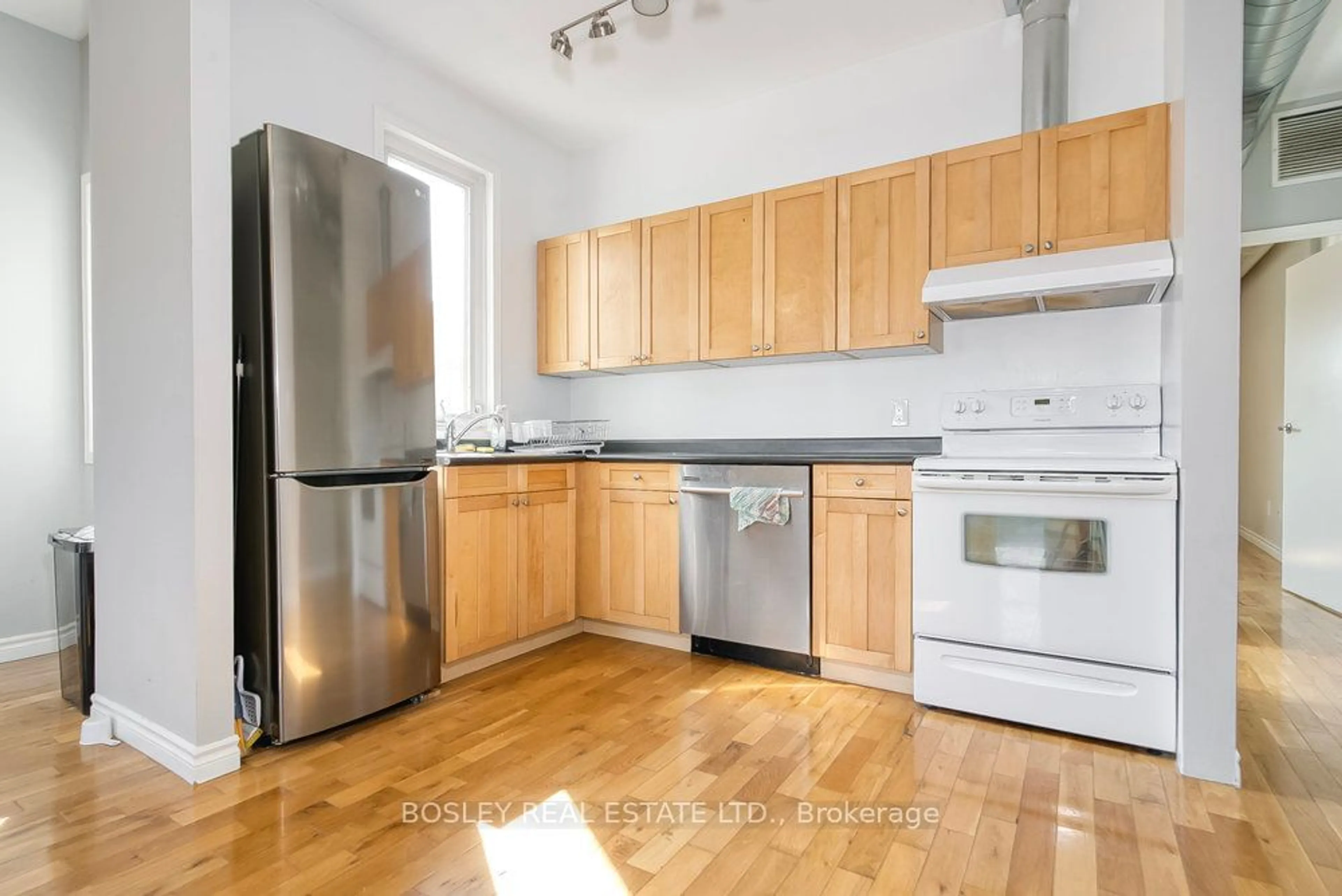 Standard kitchen, wood floors for 2909 Dundas St, Toronto Ontario M6P 1Z1