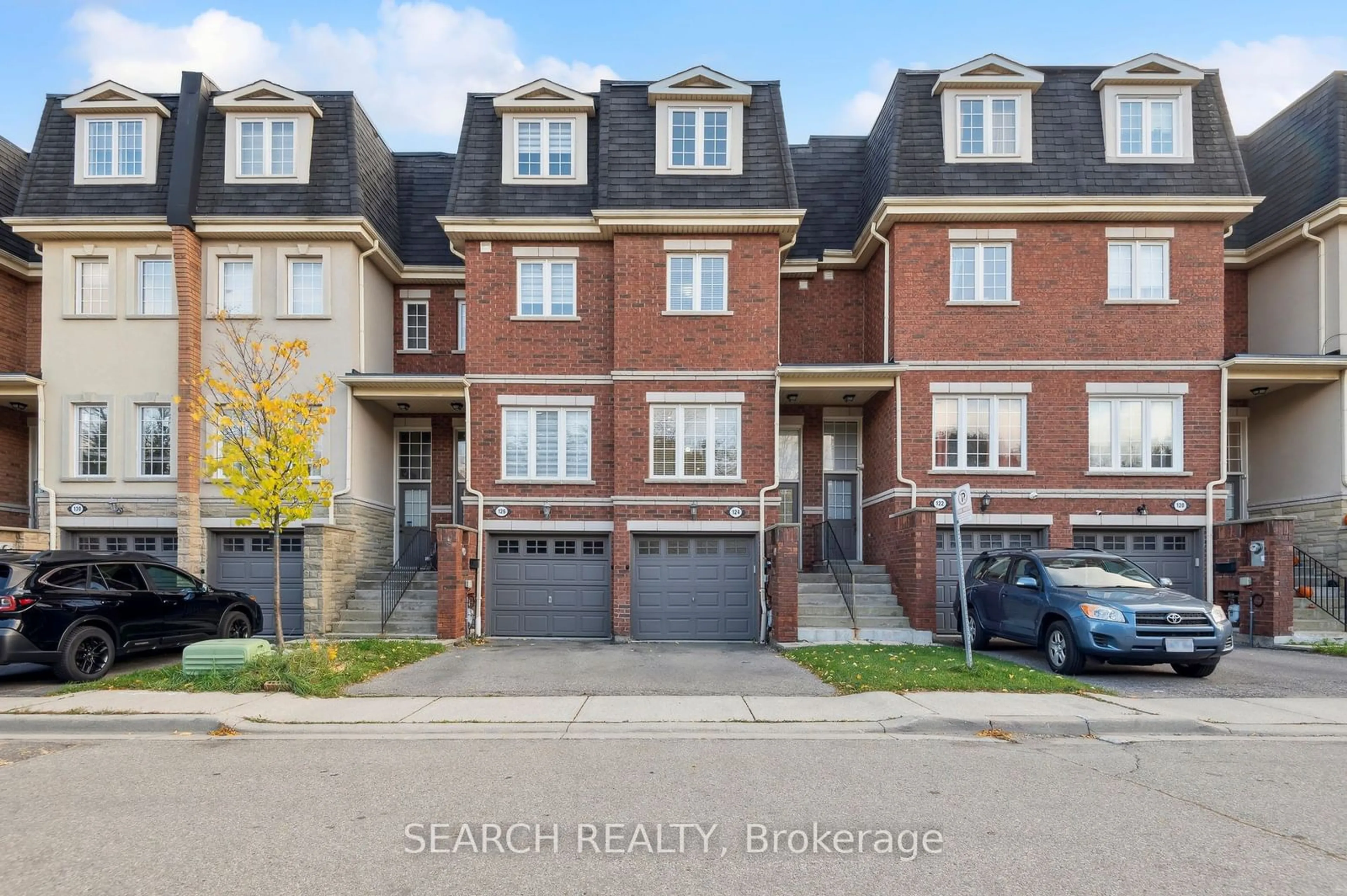 A pic from exterior of the house or condo, the street view for 435 Hensall Circ #124, Mississauga Ontario L5A 4P1