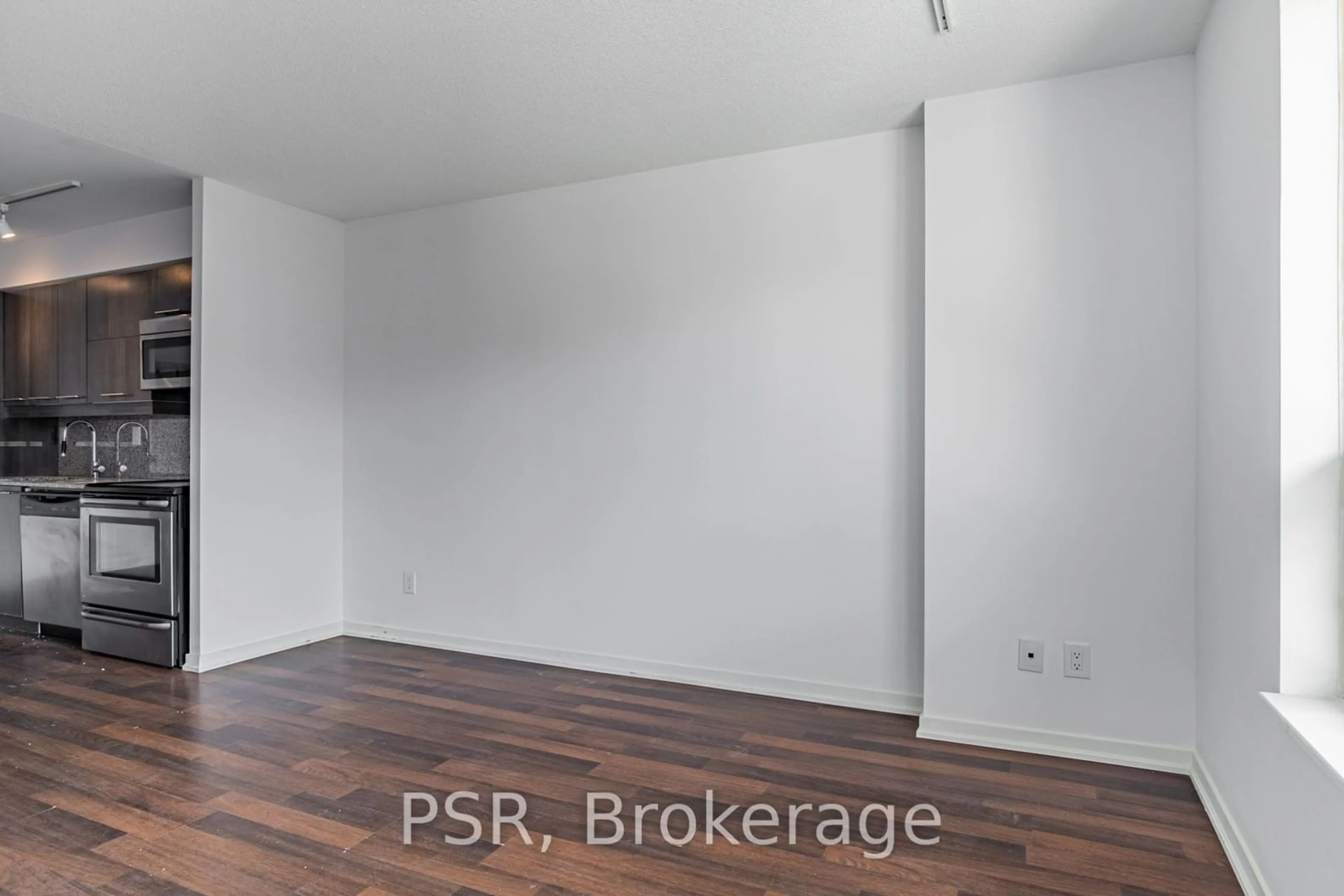 A pic of a room, not visible floor for 38 Joe Shuster Way #201, Toronto Ontario M6K 0A5