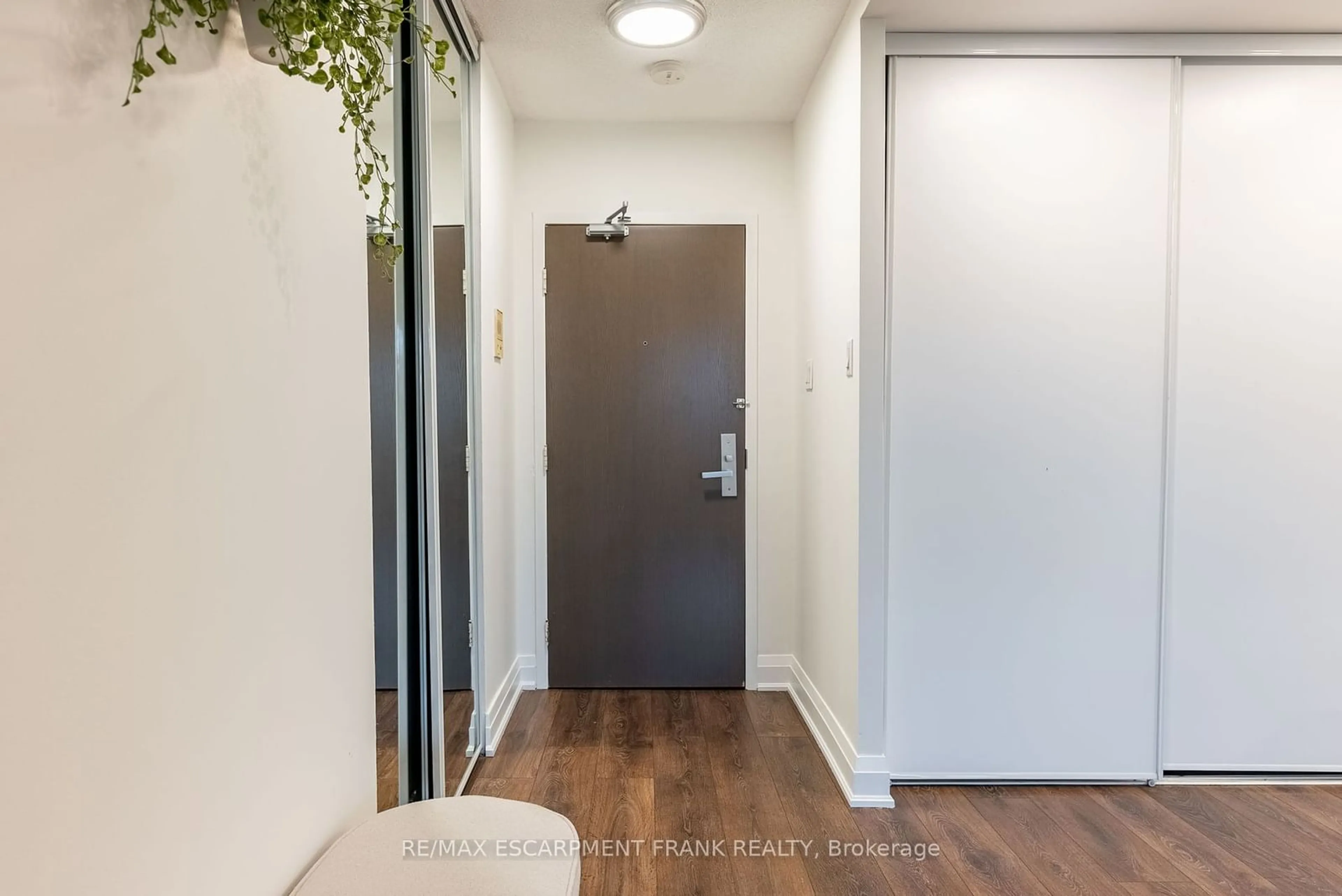 Indoor entryway, wood floors for 45 Southport St #212, Toronto Ontario M6S 3N5