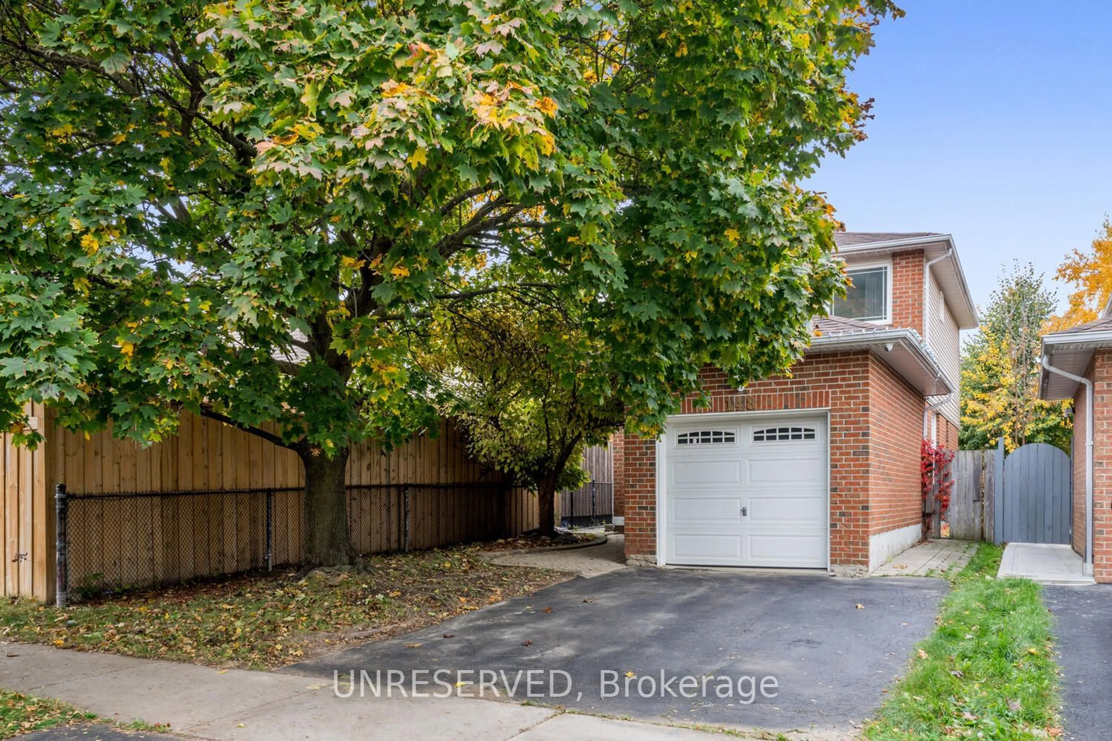 A pic from exterior of the house or condo, the fenced backyard for 148 Sunforest Dr, Brampton Ontario L6Z 2B6