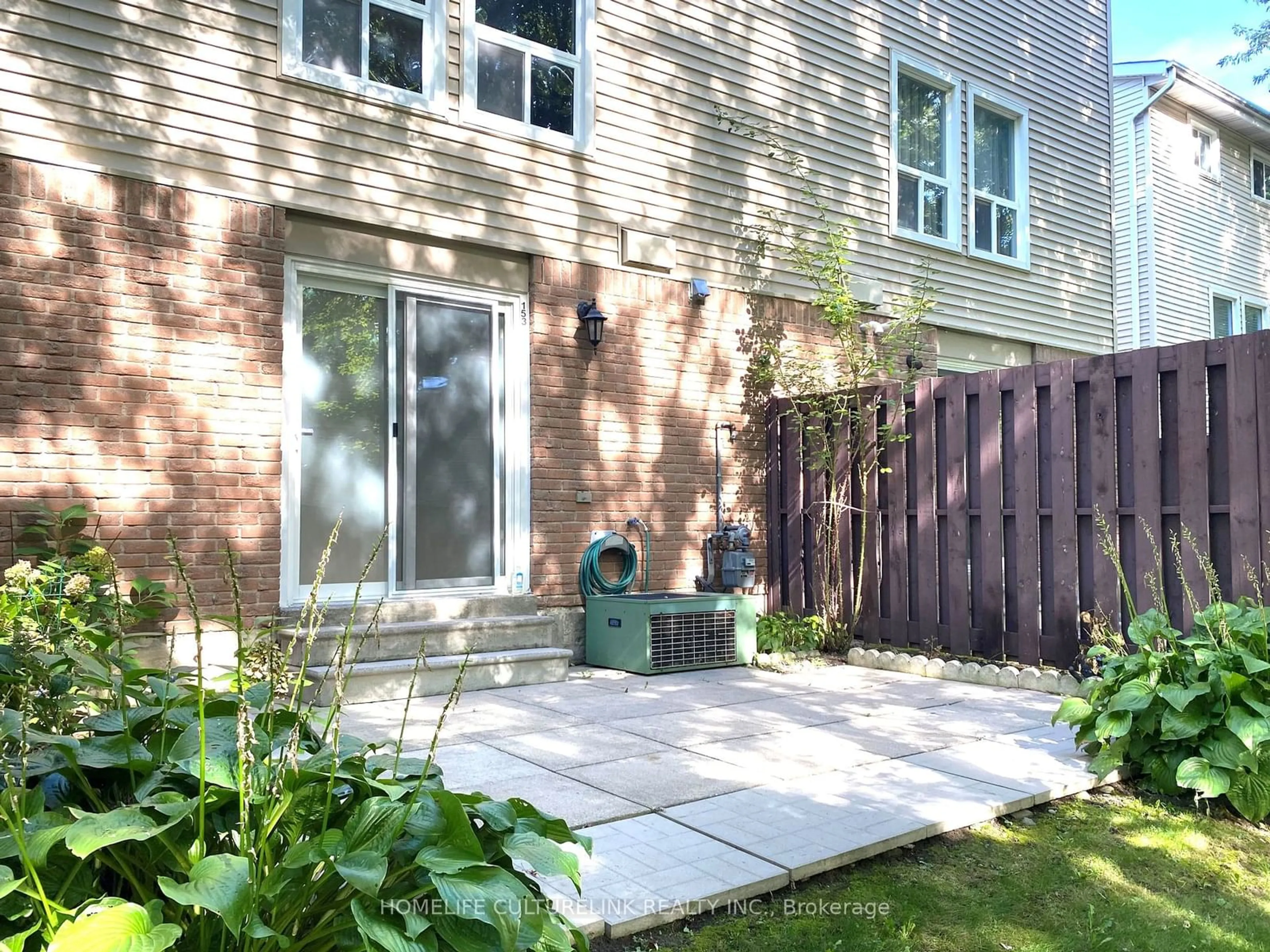 Patio, the fenced backyard for 153 Enderby Cres, Brampton Ontario L6T 4C7