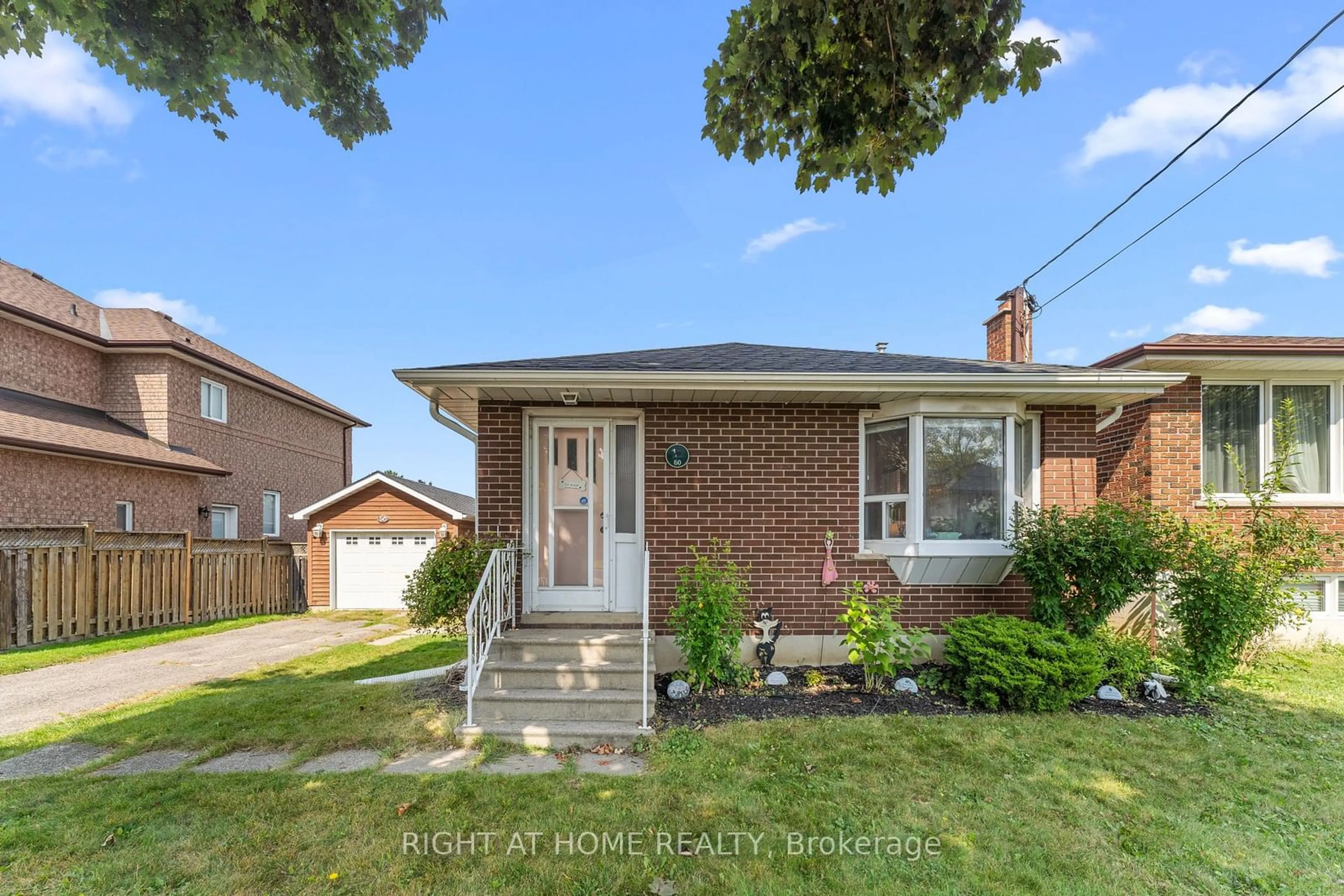 Home with brick exterior material for 50 Lilac Ave, Toronto Ontario M9M 1G3