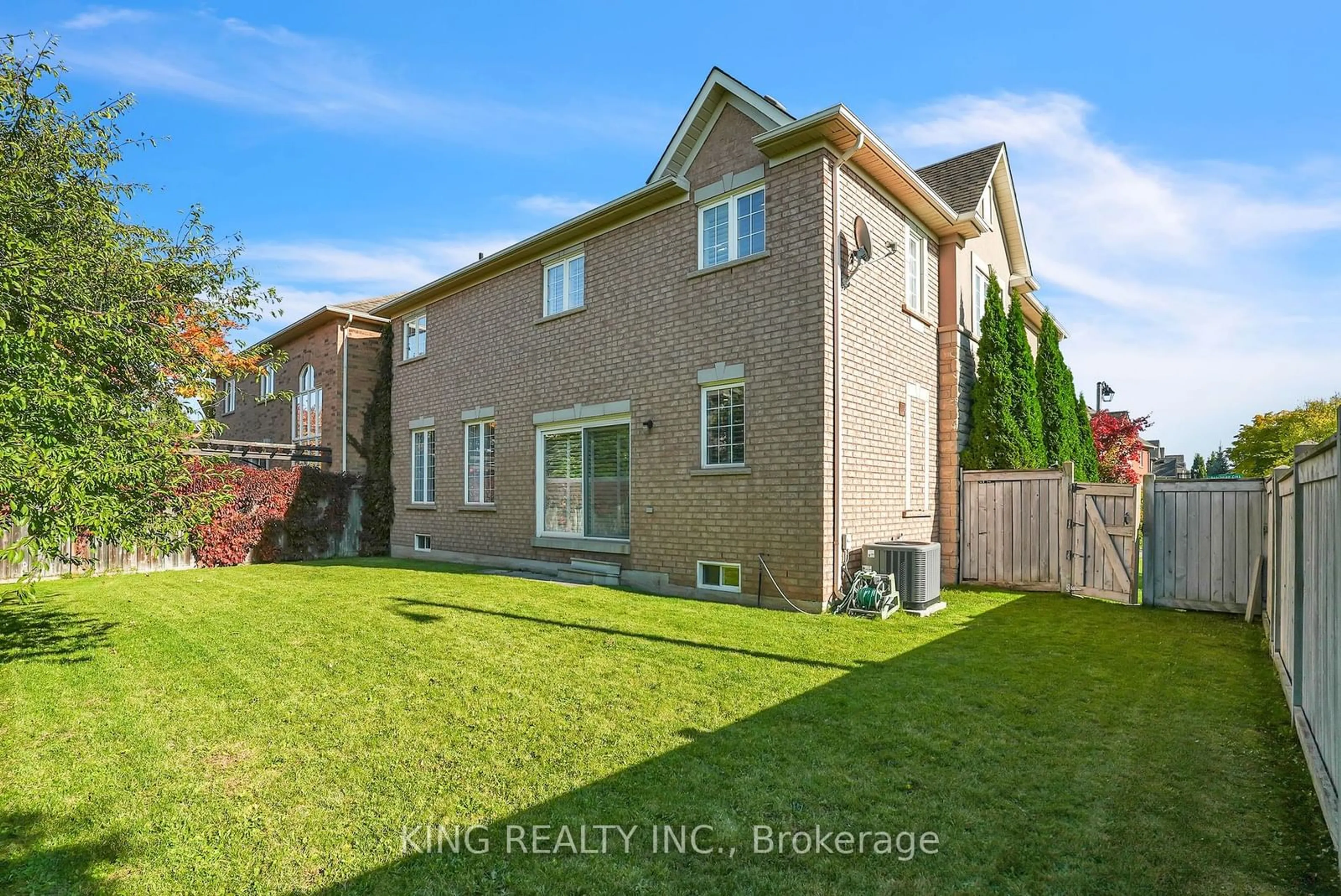 Frontside or backside of a home, the fenced backyard for 251 Beechtree Cres, Oakville Ontario L6L 0A5