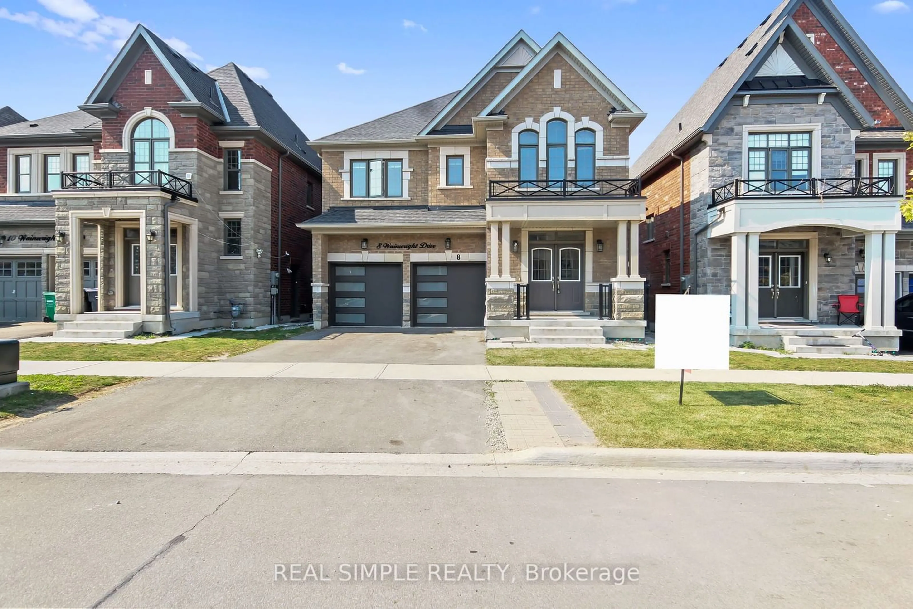 Frontside or backside of a home, the street view for 8 Wainwright Dr, Brampton Ontario L7A 4Y6