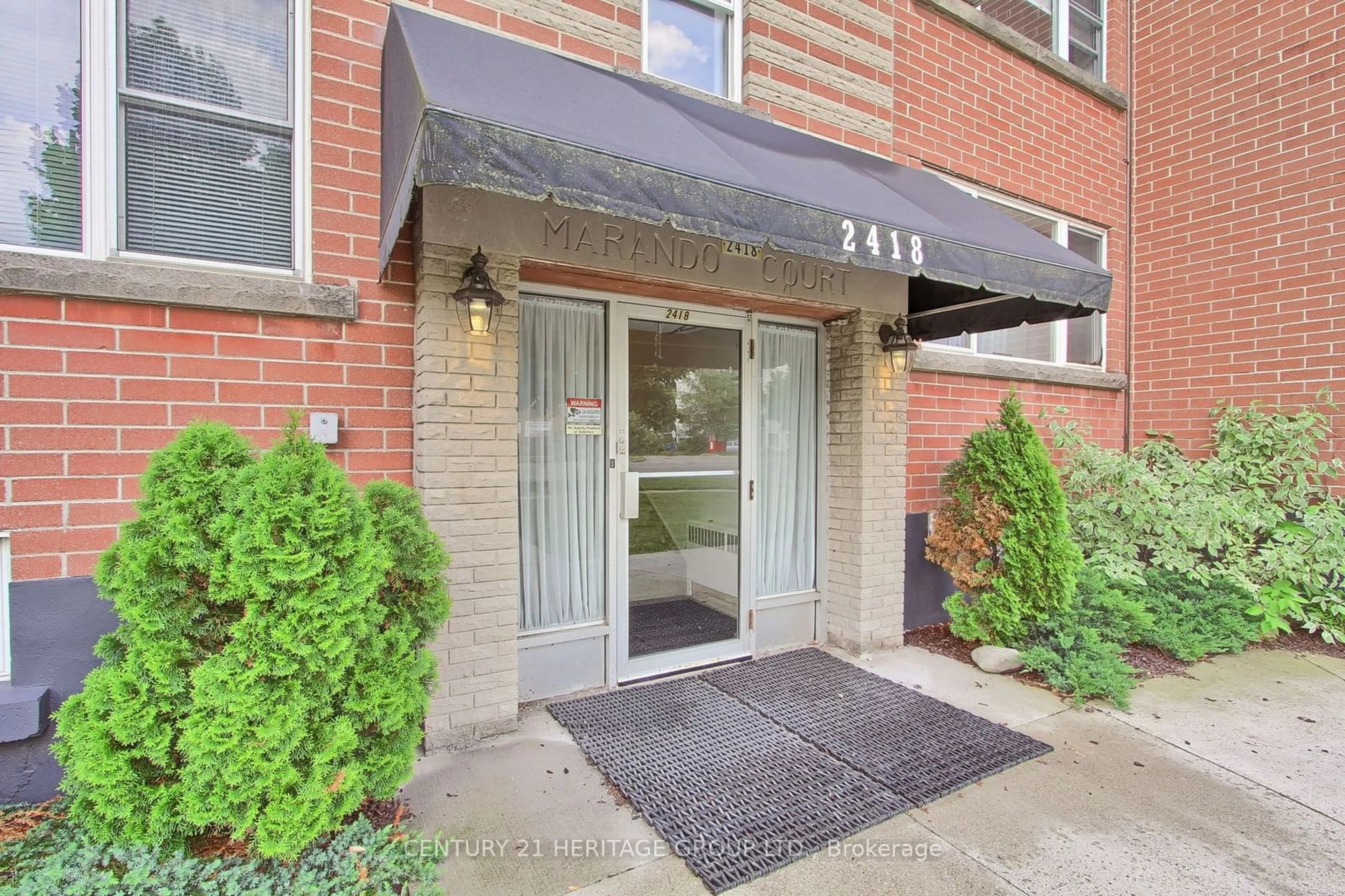 A pic from exterior of the house or condo, the street view for 2418 New St #8, Burlington Ontario L7R 1J6