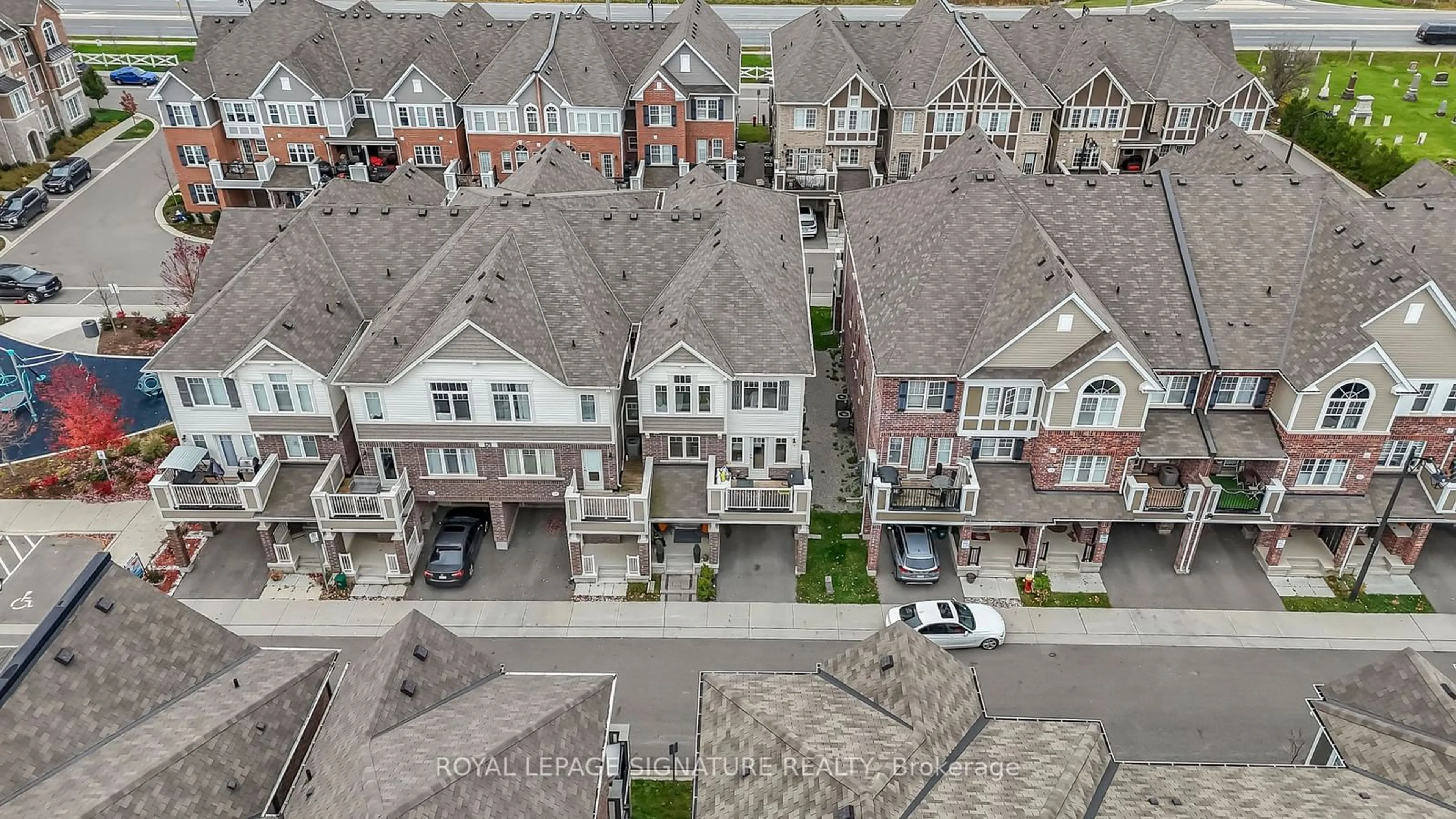 A pic from exterior of the house or condo, the street view for 1222 Rose Way #47, Milton Ontario L9T 7E7