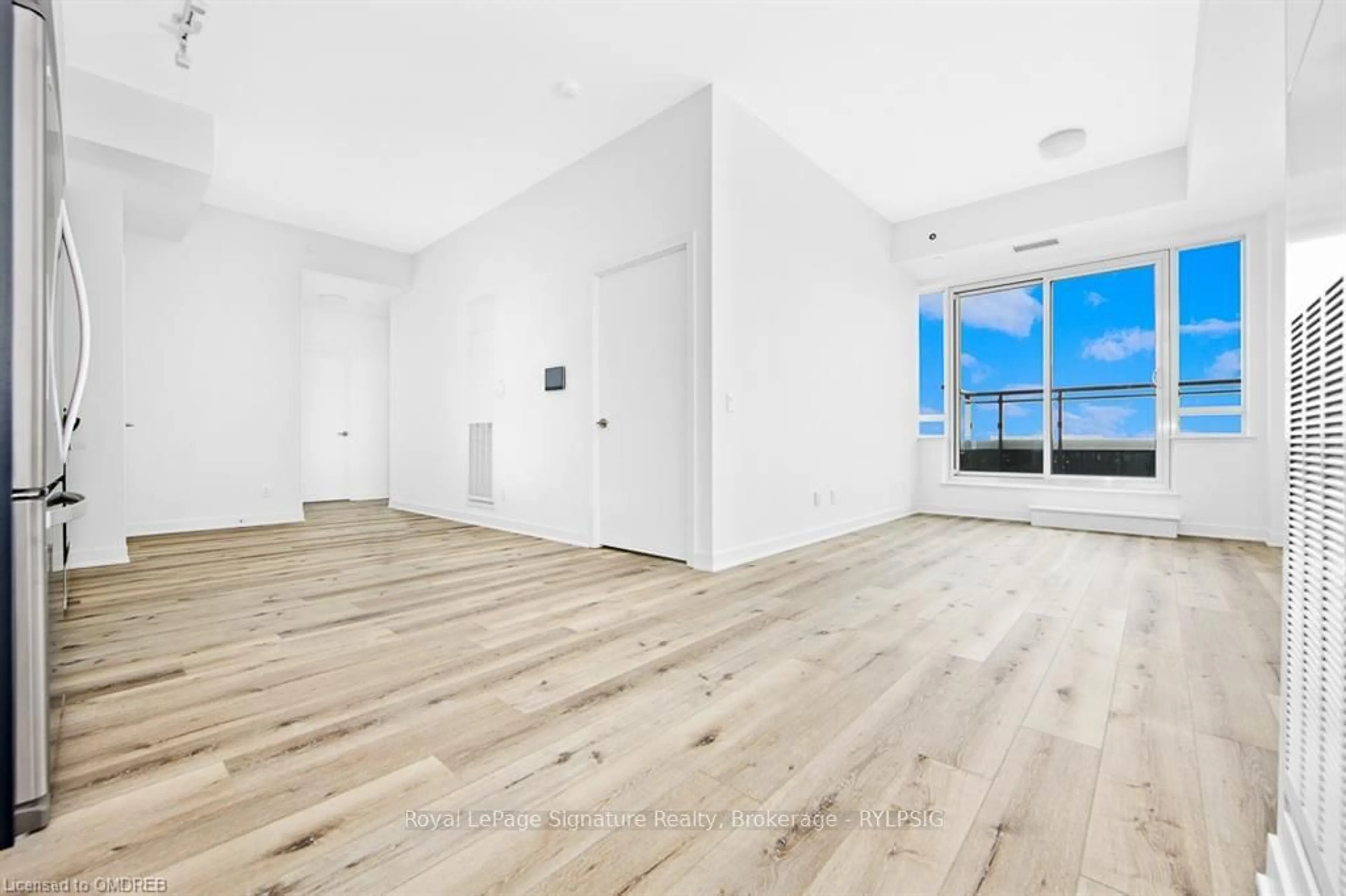 A pic of a room, wood floors for 405 DUNDAS St #LPH02, Oakville Ontario L6M 4P9