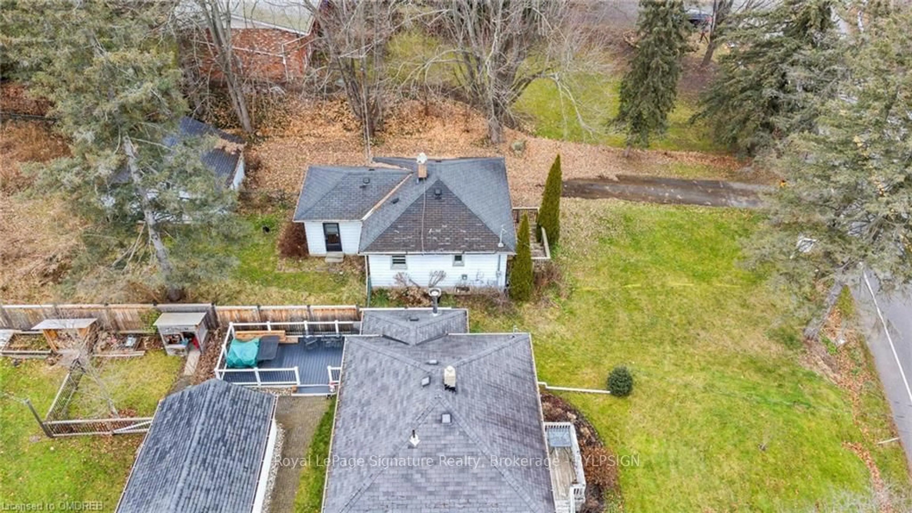 Frontside or backside of a home, the fenced backyard for 6406 CEDAR SPRINGS Rd, Burlington Ontario L7P 0L1