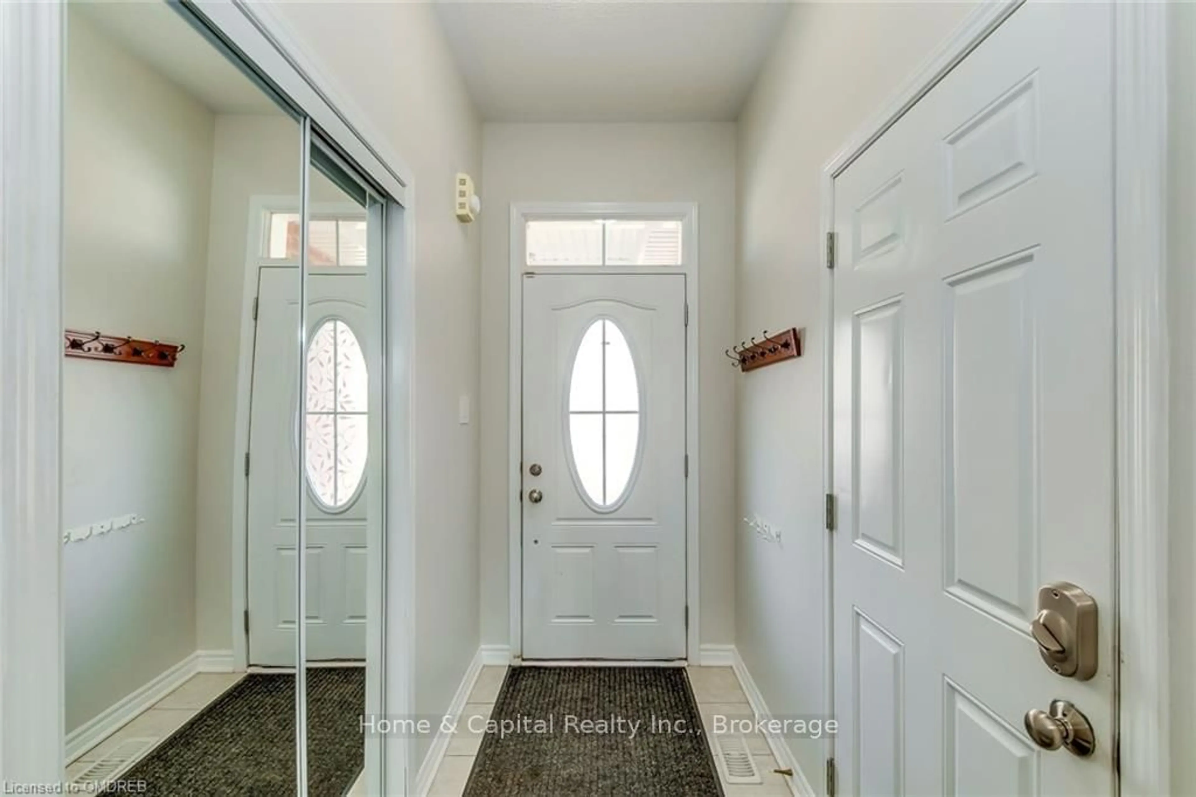 Indoor entryway, wood floors for 1663 CLITHEROW St, Milton Ontario L9E 0A2