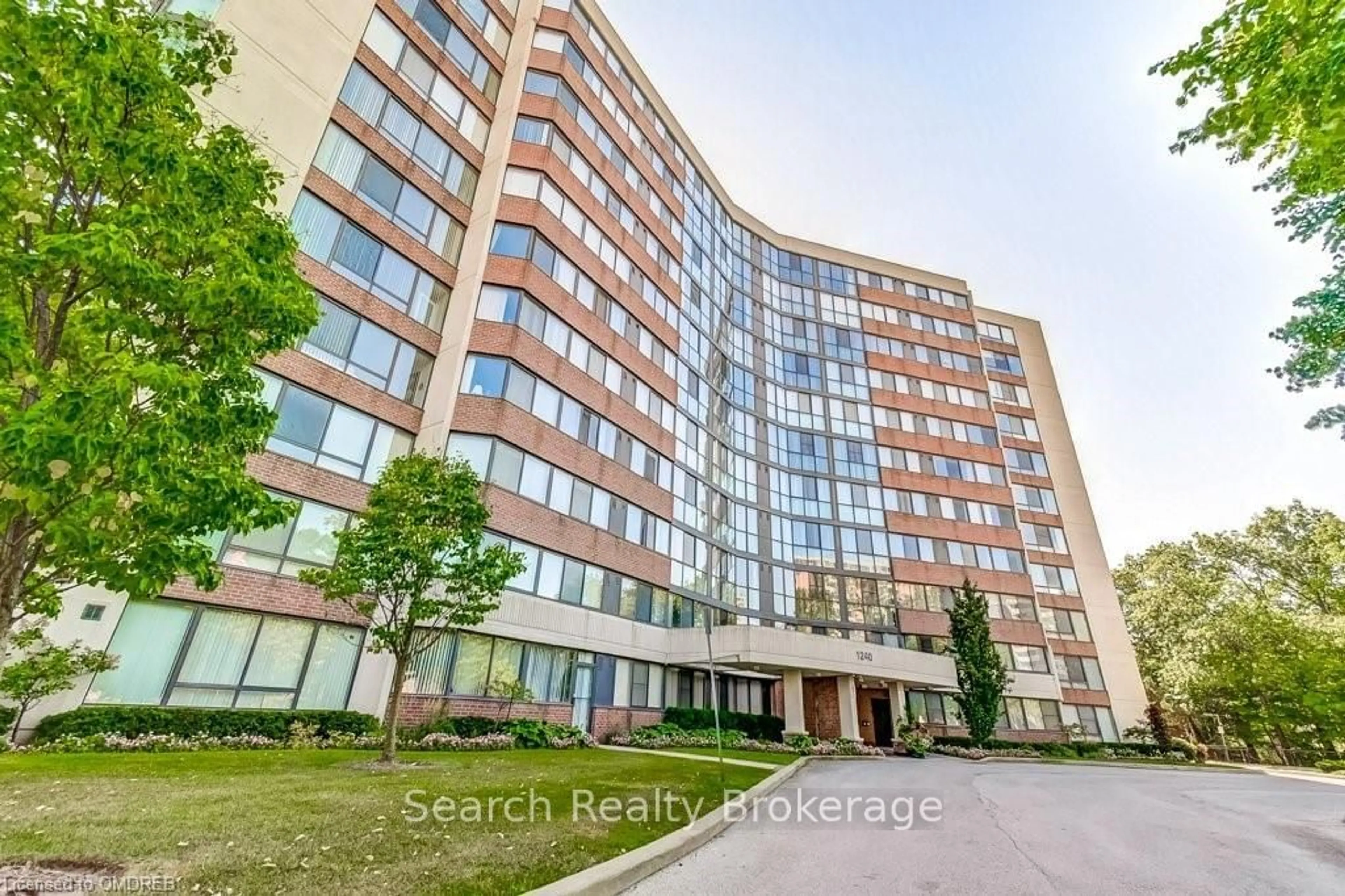 A pic from exterior of the house or condo, the front or back of building for 1240 MARLBOROUGH Crt #310, Oakville Ontario L6H 3K7