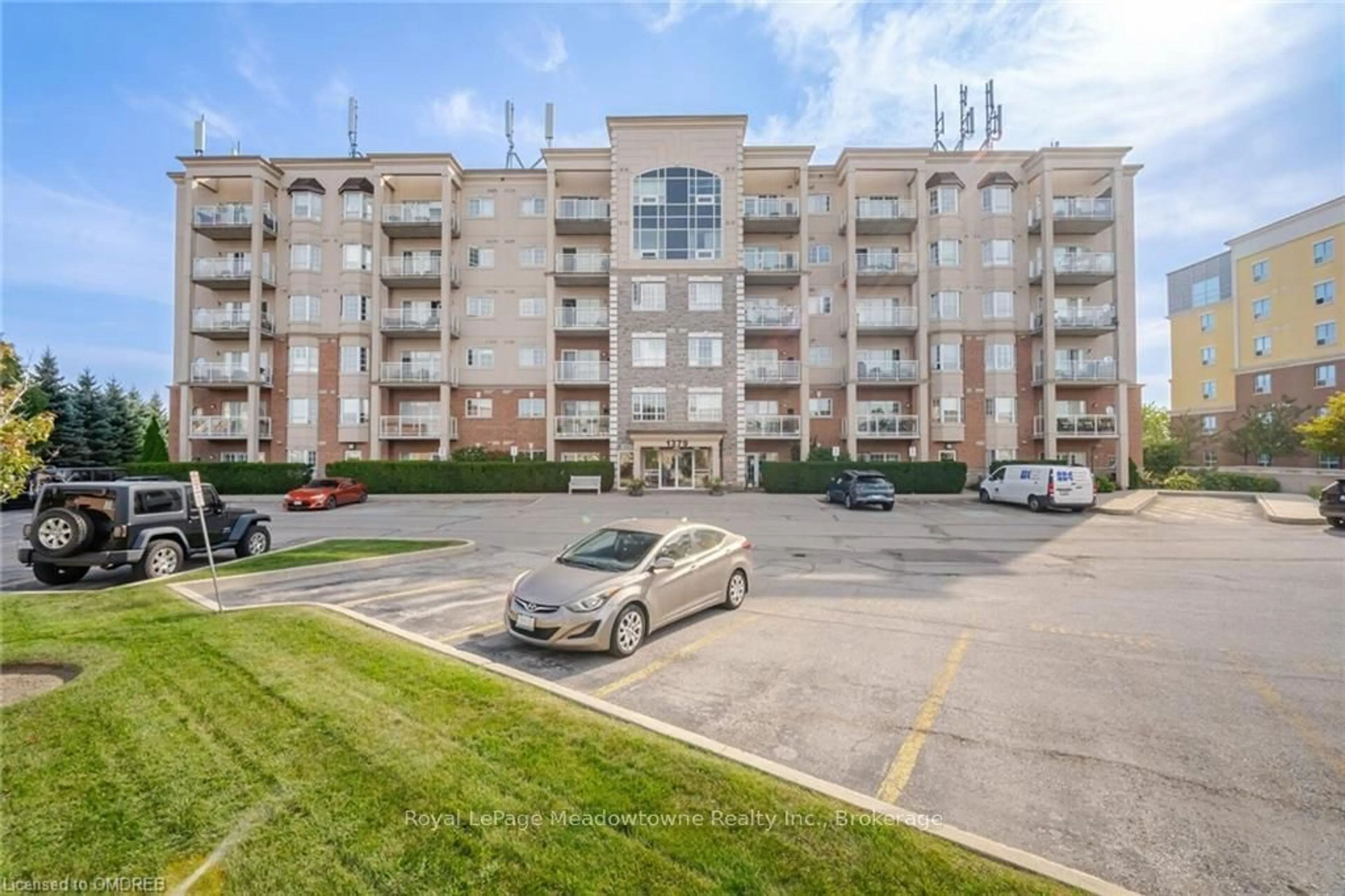 A pic from exterior of the house or condo, the street view for 1379 COSTIGAN Rd #607, Milton Ontario L9T 2K6