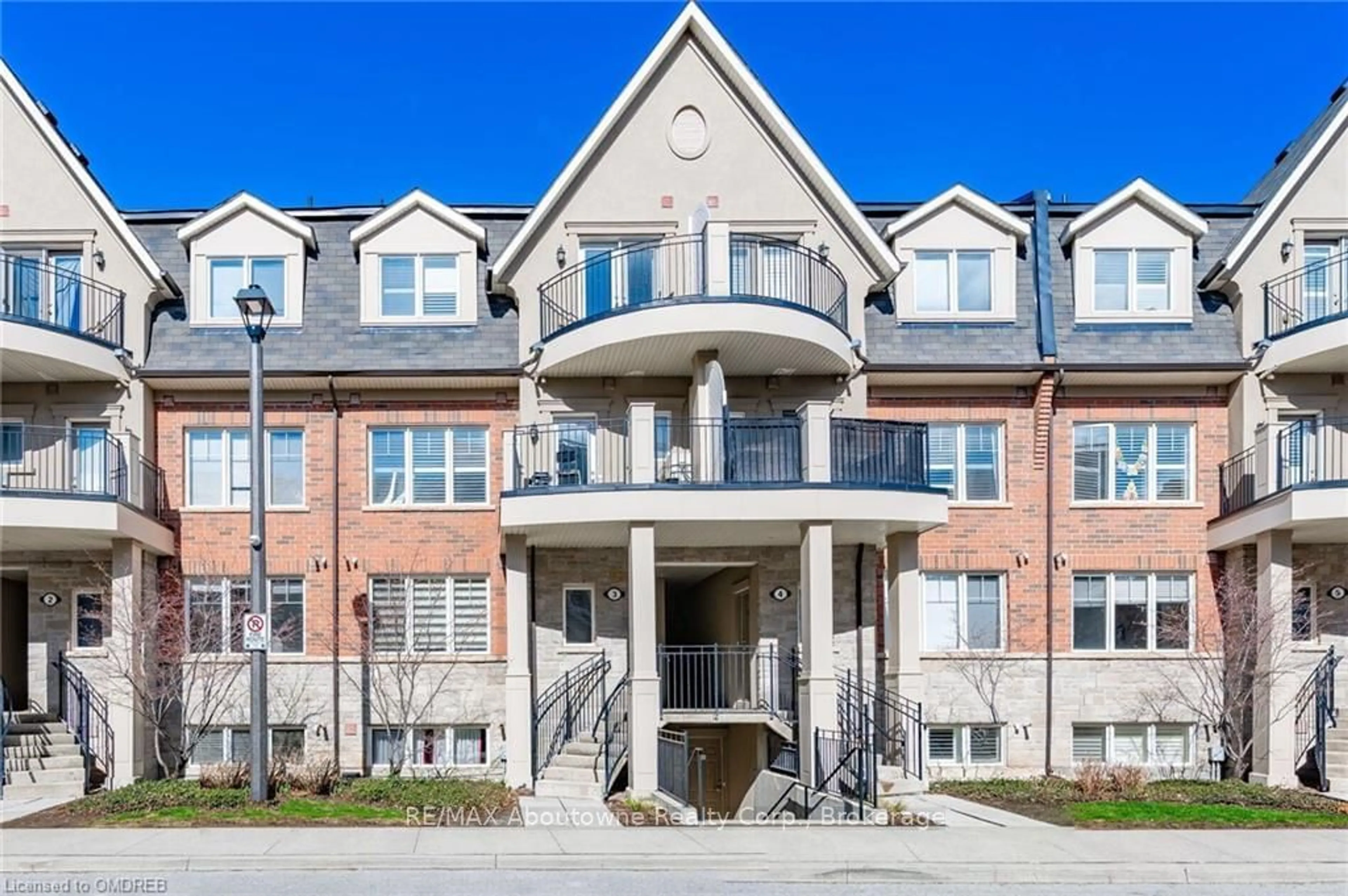 A pic from exterior of the house or condo, the front or back of building for 2420 BARONWOOD Dr #4-01, Oakville Ontario L6M 0X6