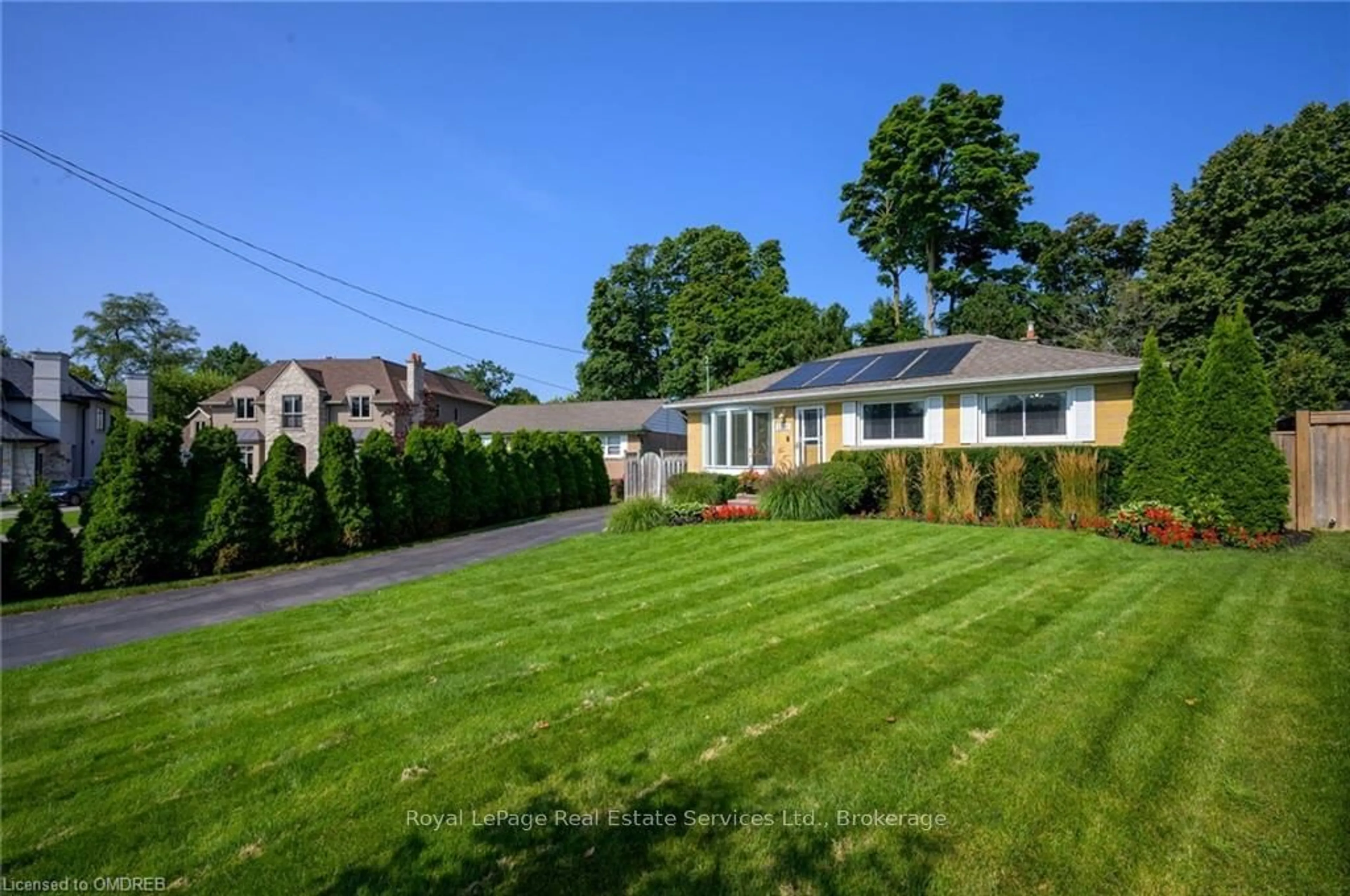 Frontside or backside of a home, the fenced backyard for 1381 CONSTANCE Dr, Oakville Ontario L6J 2T8