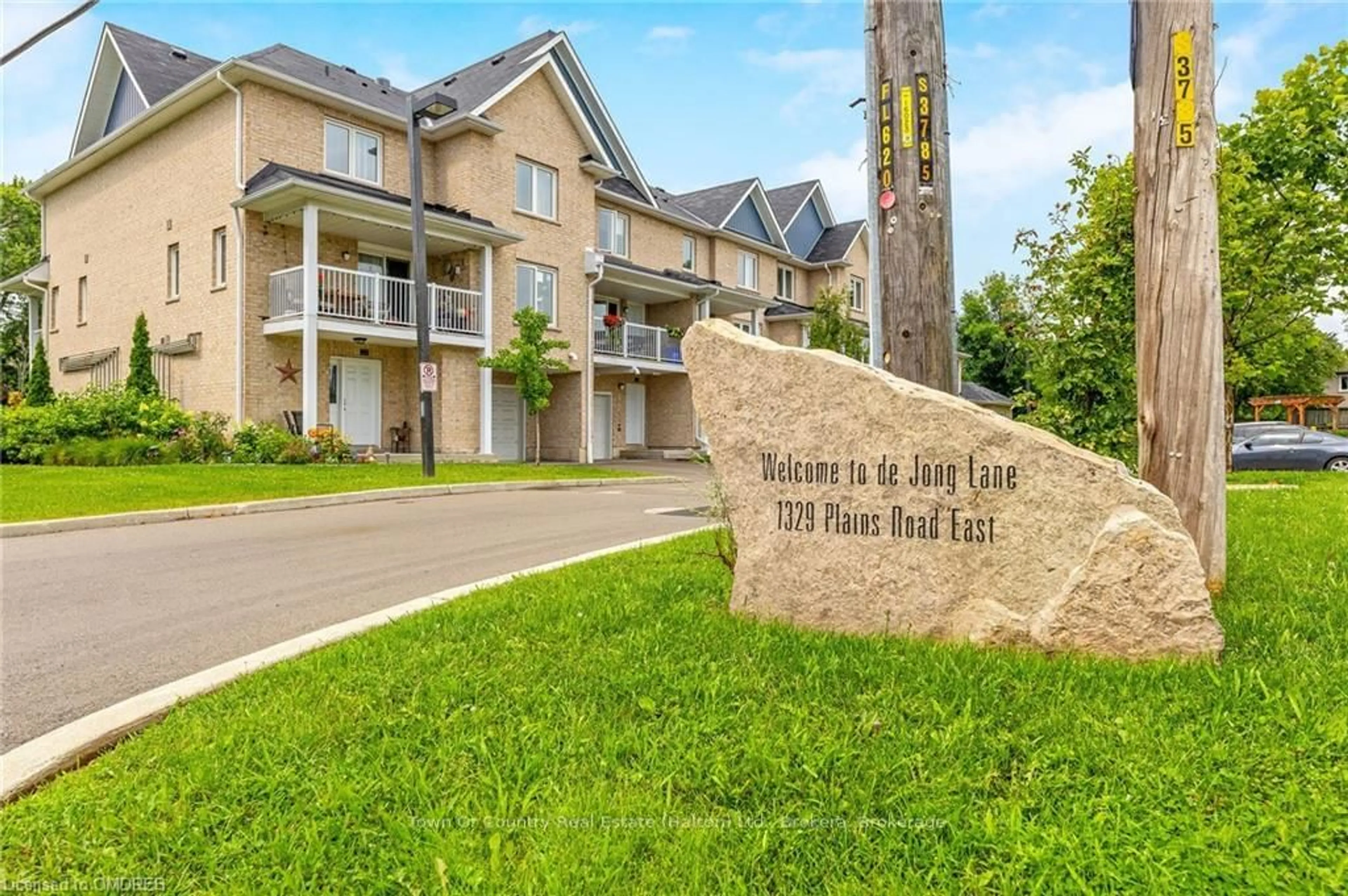 A pic from exterior of the house or condo, the street view for 1329 PLAINS Rd #2, Burlington Ontario L7R 3P7