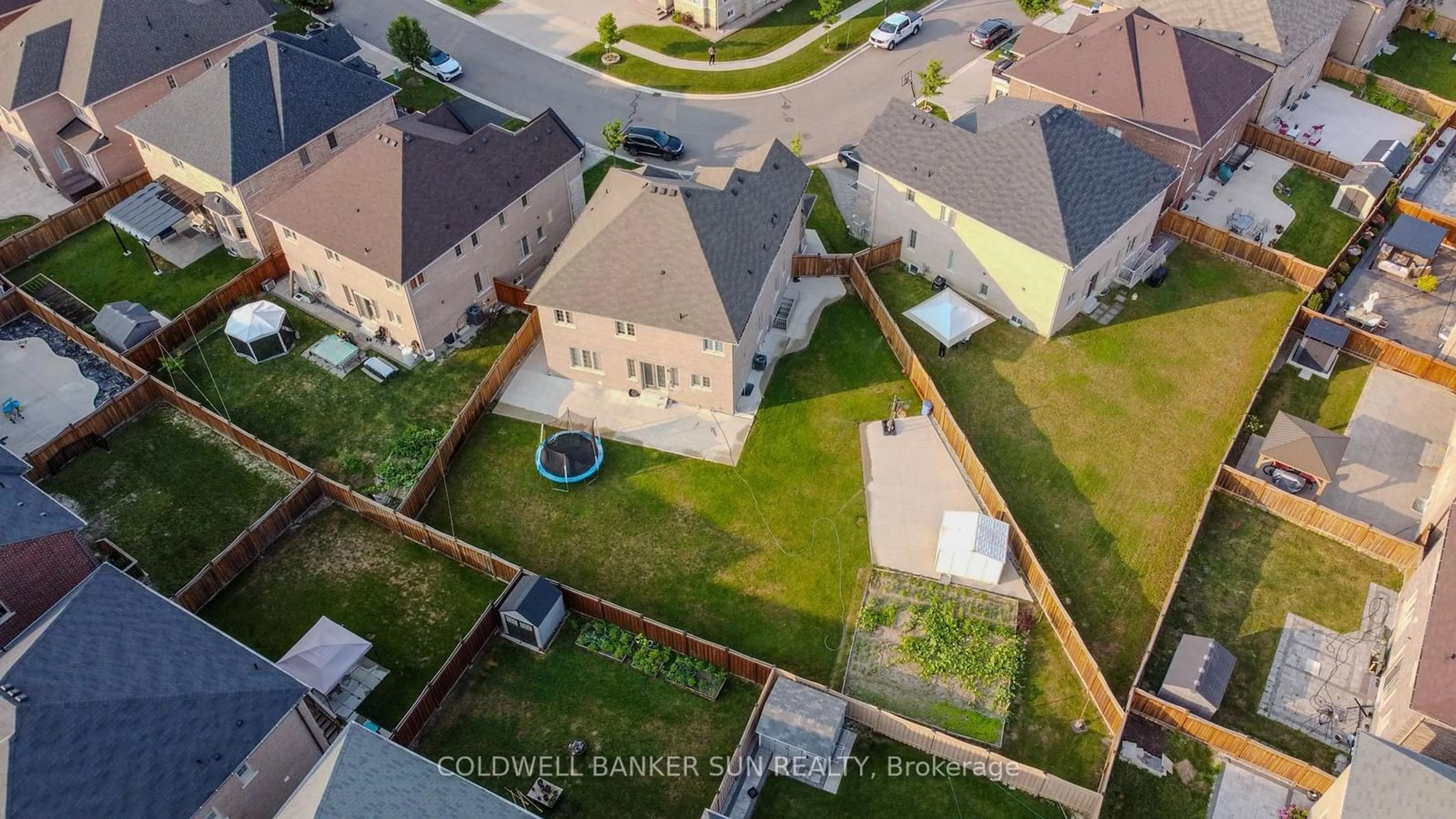 Frontside or backside of a home, the fenced backyard for 16 Archway Tr, Brampton Ontario L6P 4G8