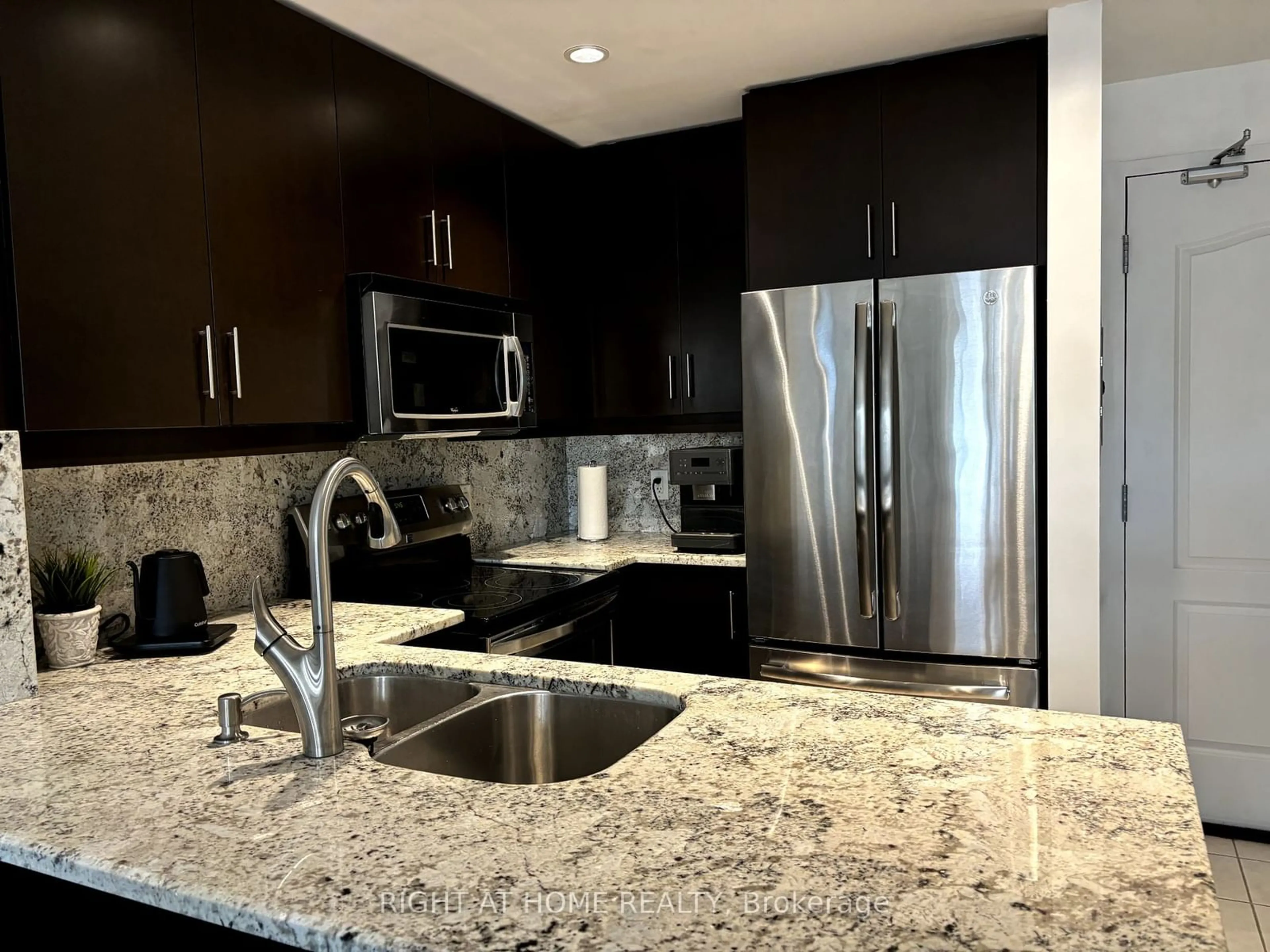 Contemporary kitchen, wood floors for 5327 Upper Middle Rd #419, Burlington Ontario L7L 0E9