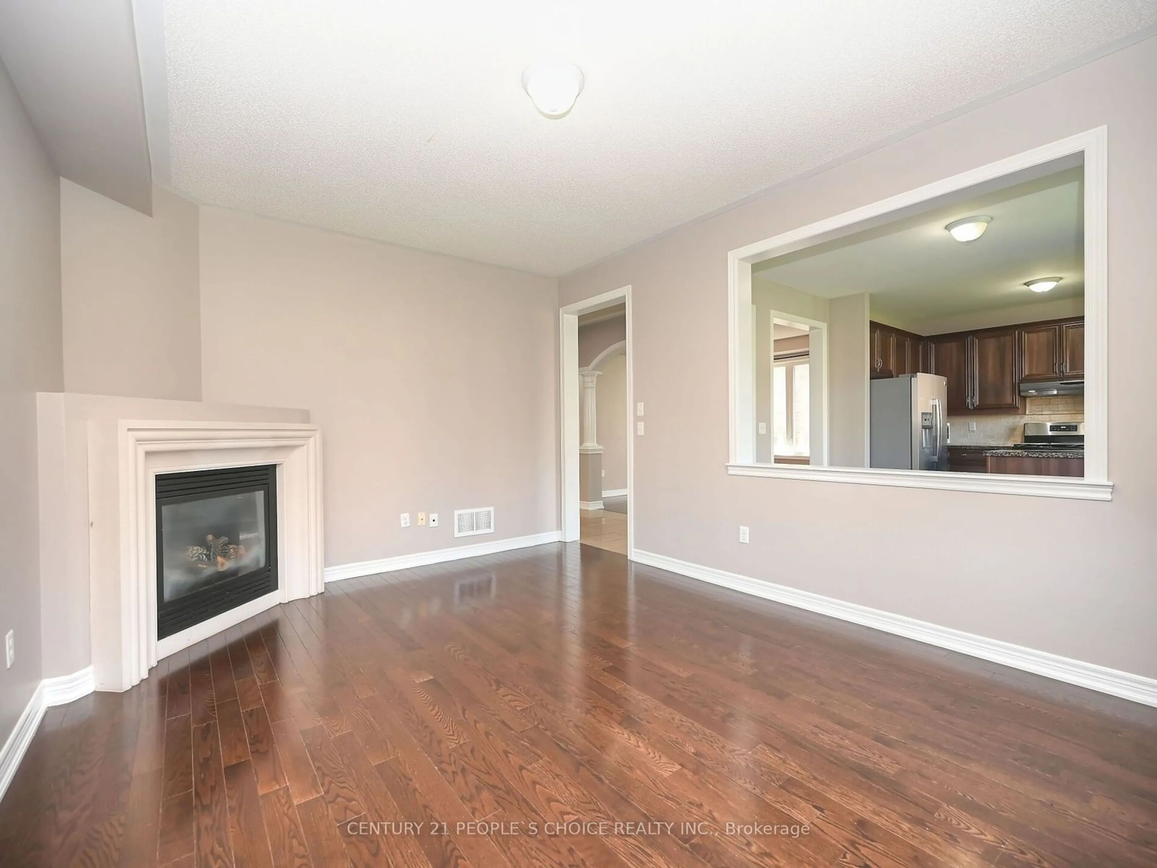 A pic of a room, wood floors for 44 Gardenbrooke Tr, Brampton Ontario L6P 3J3