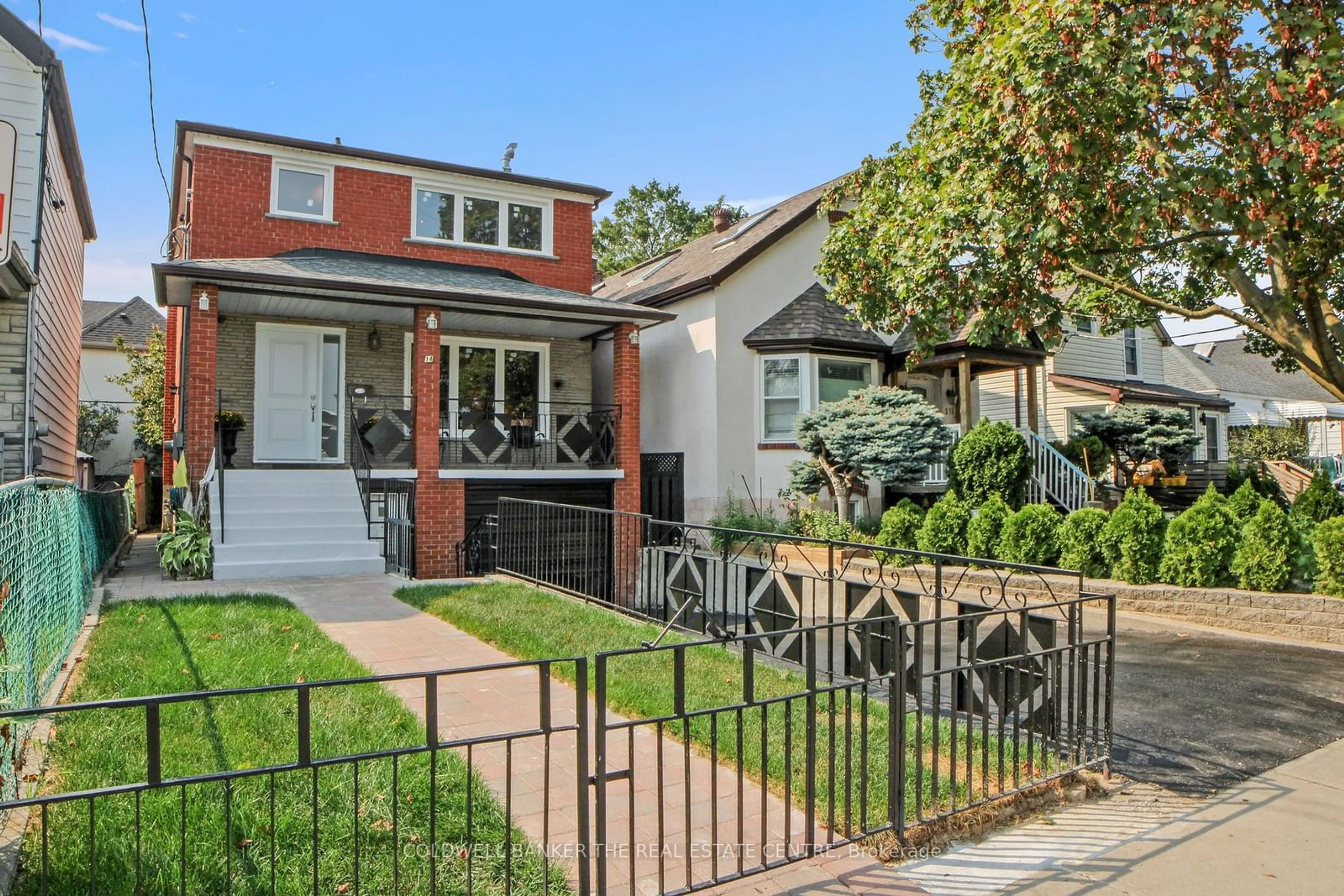 Frontside or backside of a home, the fenced backyard for 14 Greendale Ave, Toronto Ontario M6N 4P5