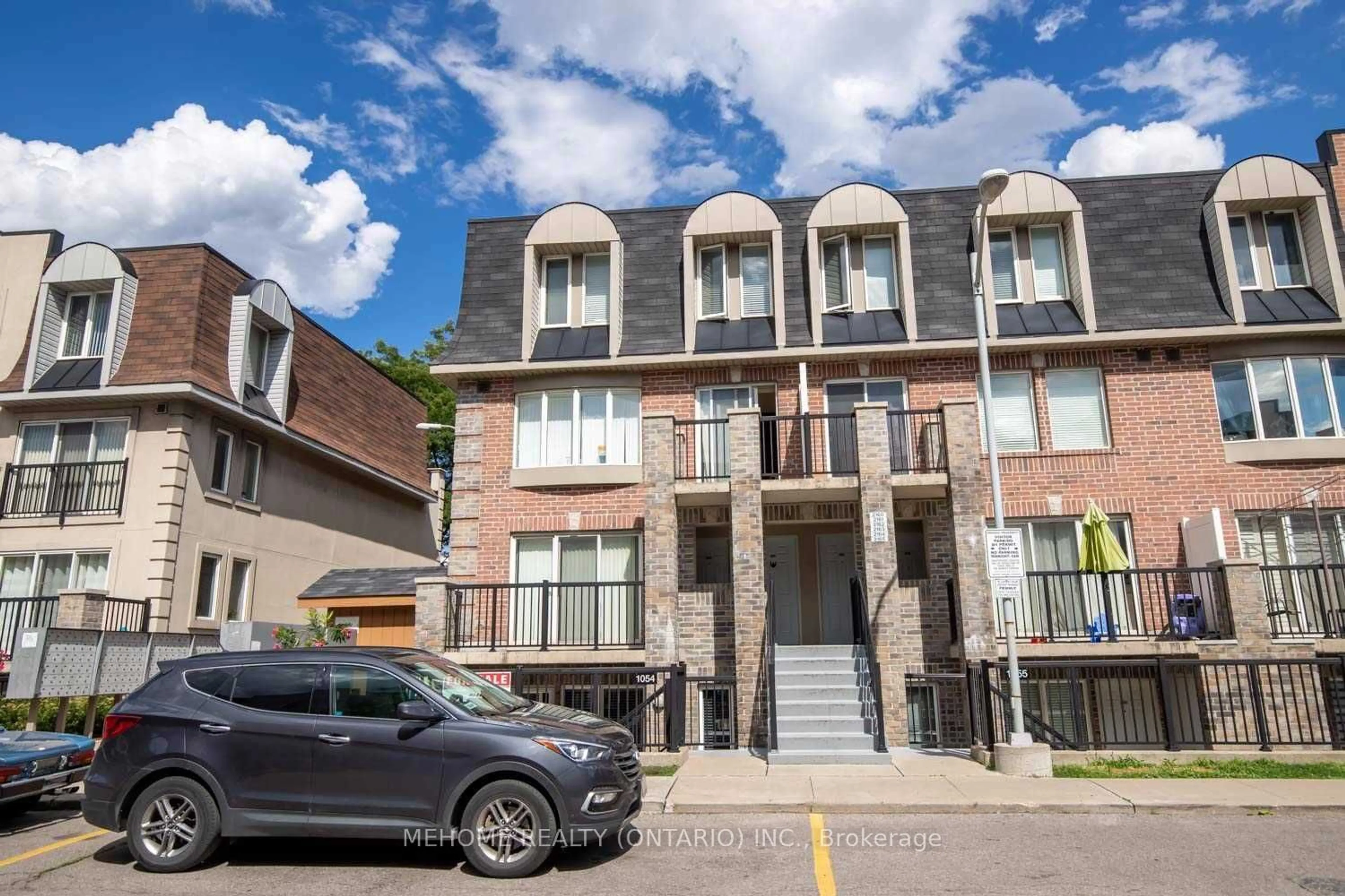 A pic from exterior of the house or condo, the street view for 95 George Appleton Way #1054, Toronto Ontario M3M 0A2