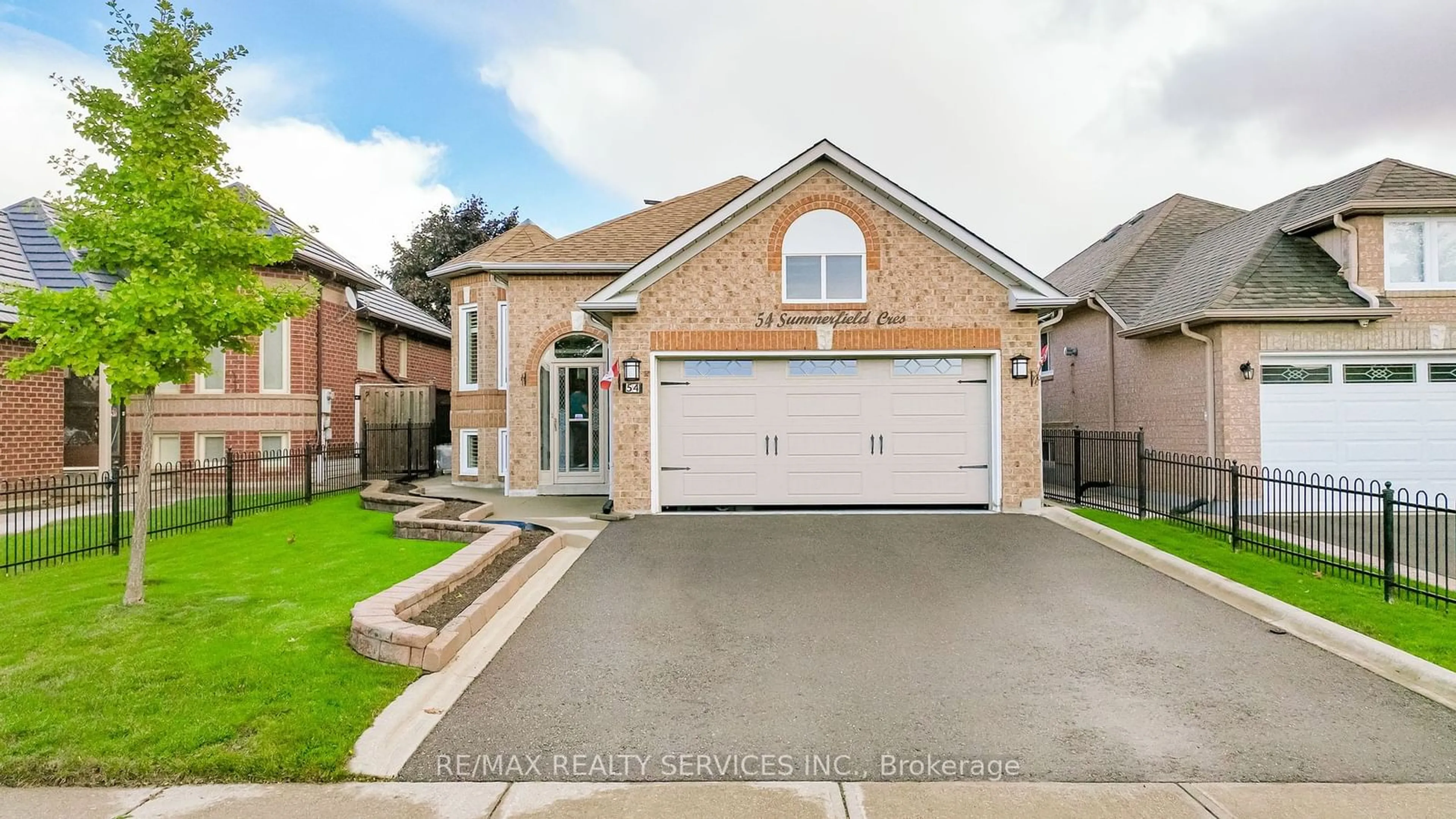 Frontside or backside of a home, the street view for 54 Summerfield Cres, Brampton Ontario L6X 4K4