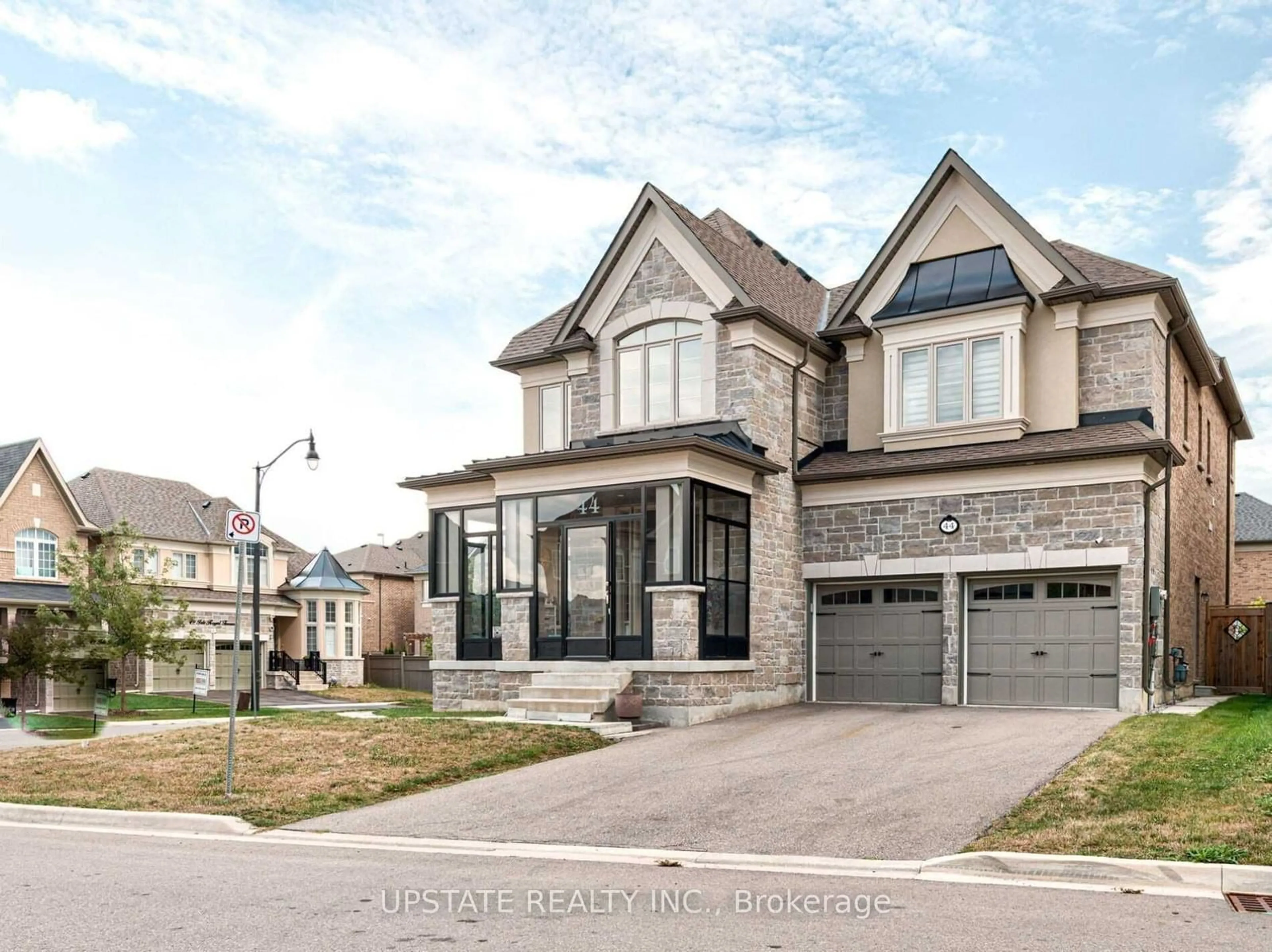 Frontside or backside of a home, the street view for 44 Isle Royal Terr, Brampton Ontario L6Y 6B4