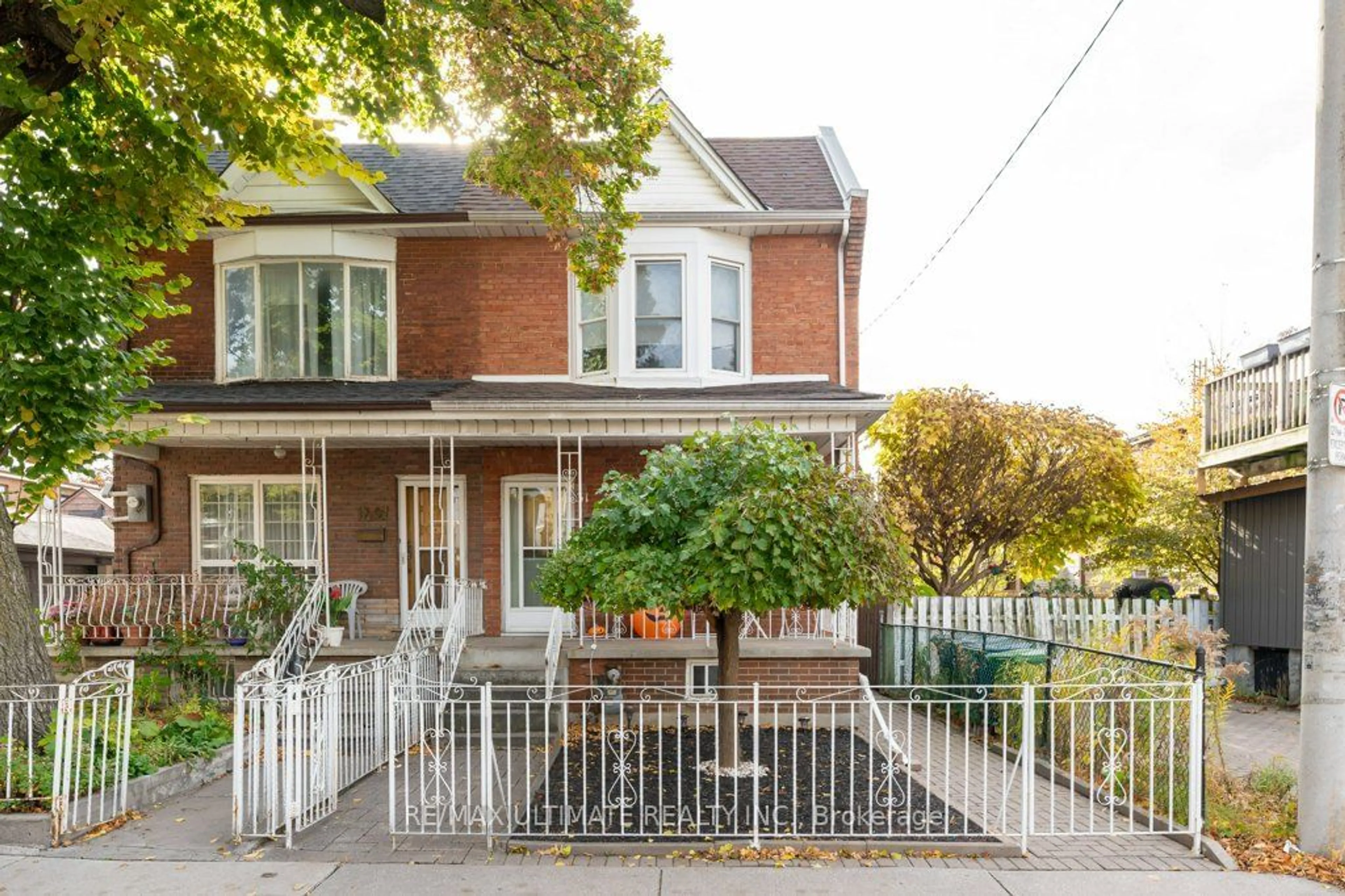 A pic from exterior of the house or condo, the fenced backyard for 31 Antler St, Toronto Ontario M6P 3R2