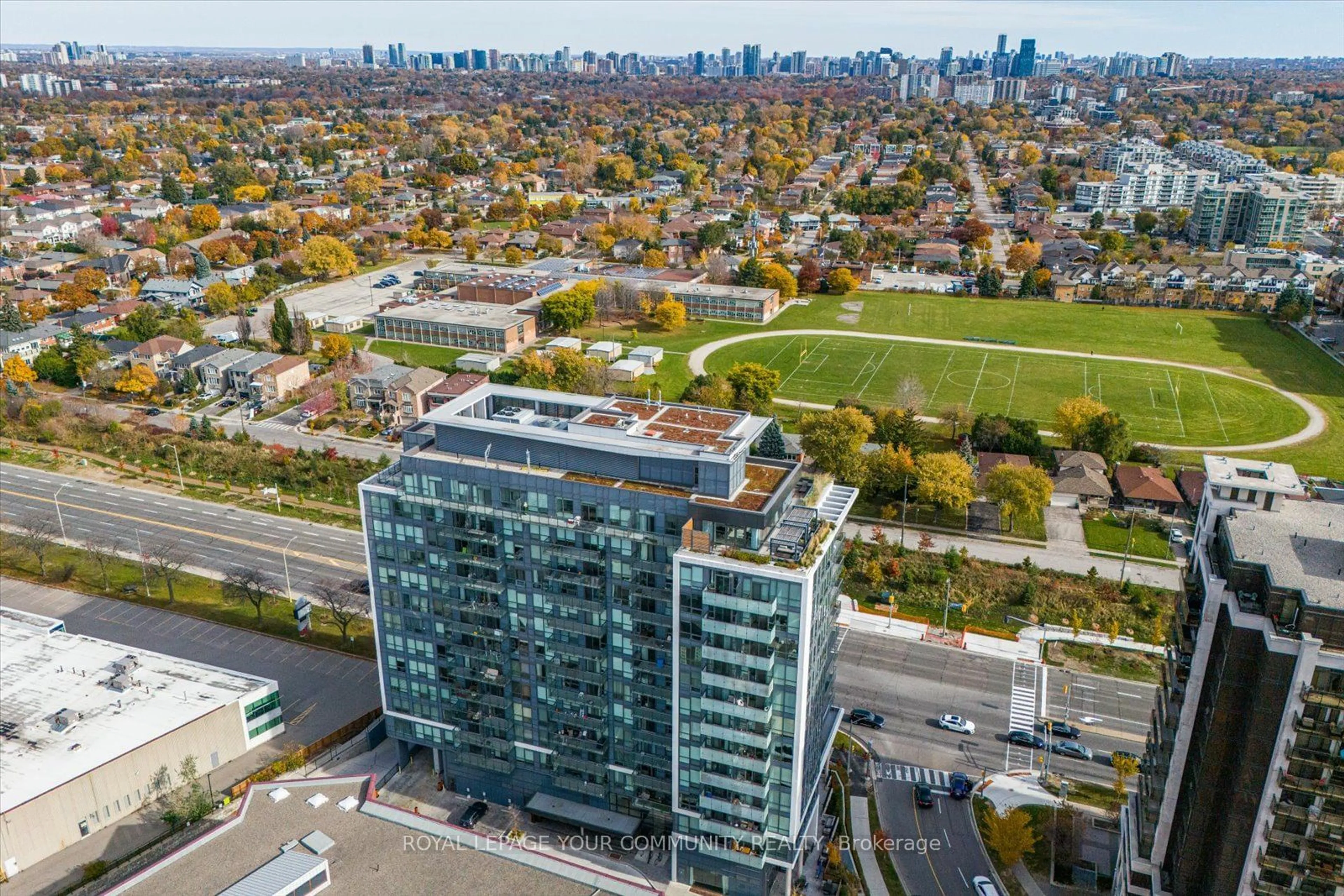 A pic from exterior of the house or condo, the view of city buildings for 10 De Boers Dr #905, Toronto Ontario M3J 0L6