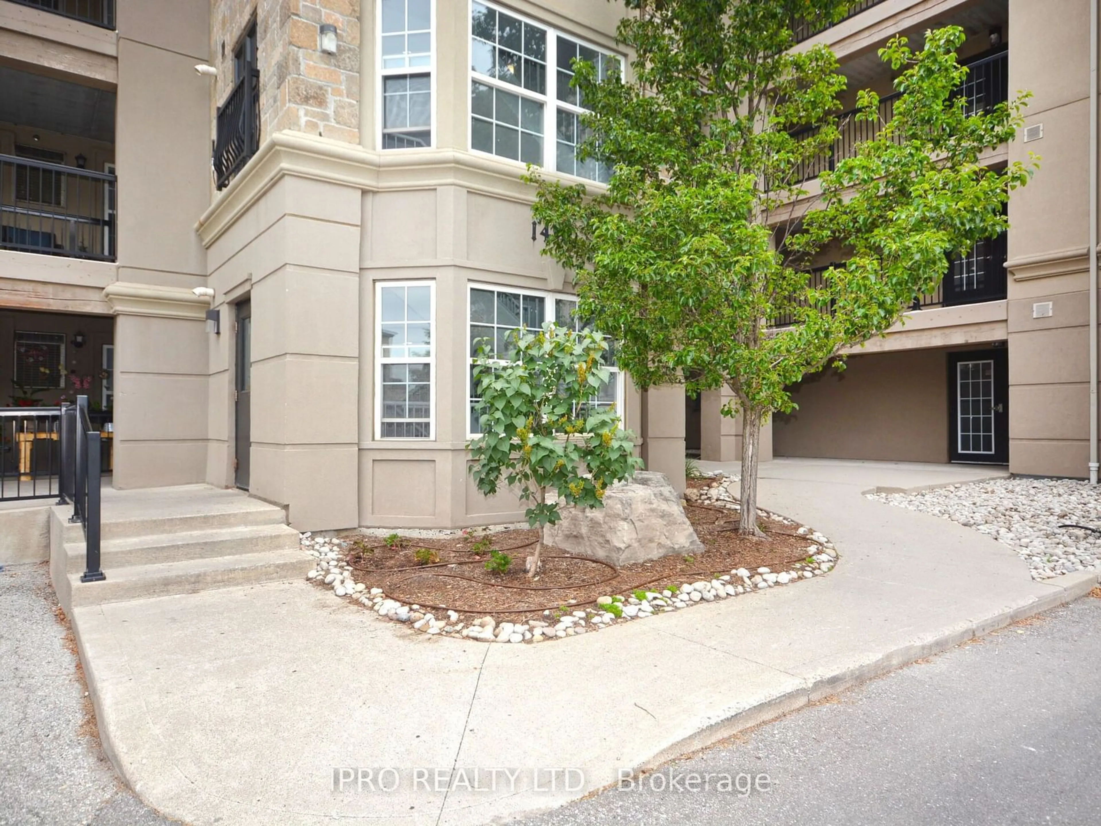 A pic from exterior of the house or condo, the street view for 1491 Maple Ave #308, Milton Ontario L9T 0B8