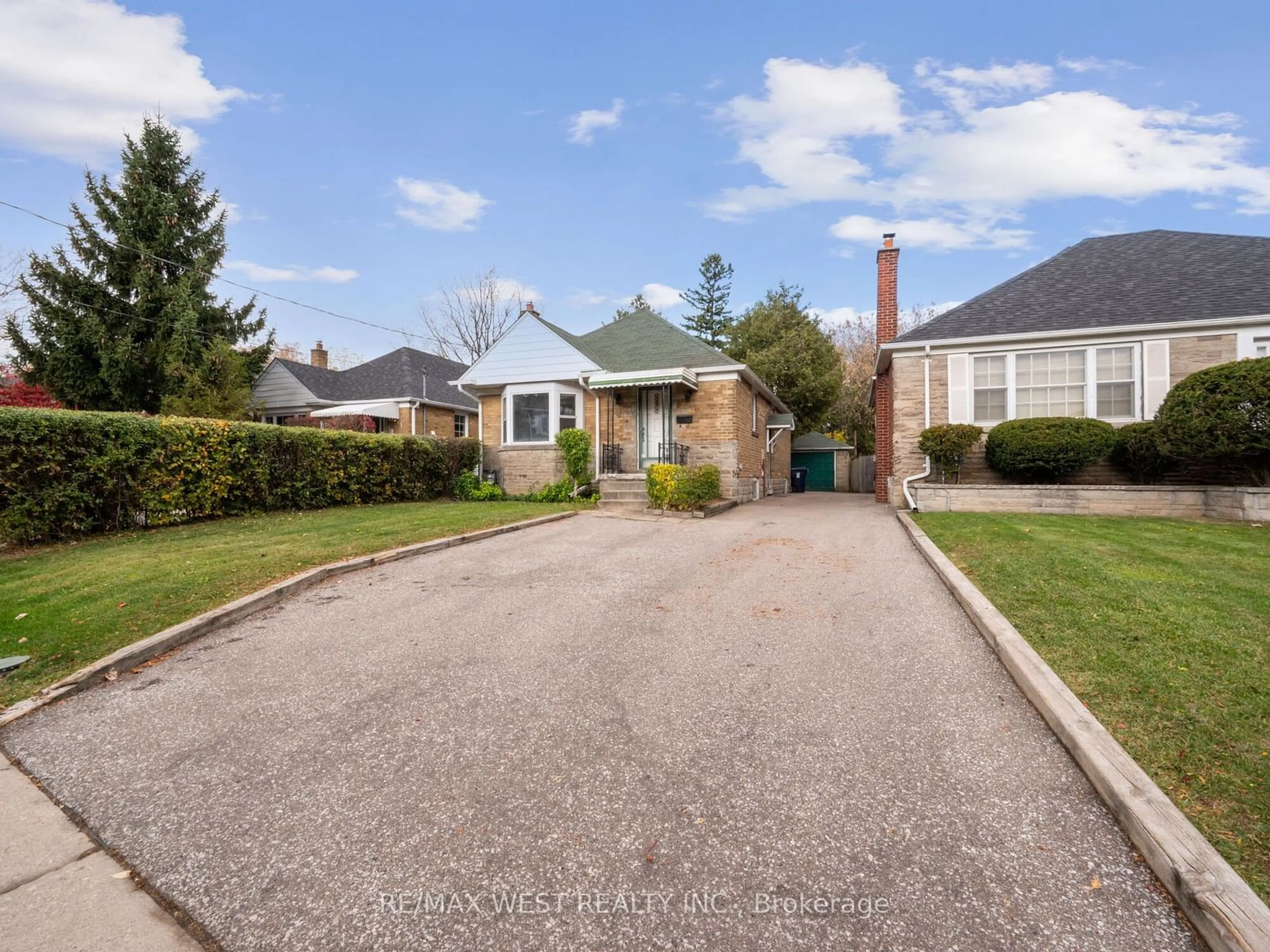 Frontside or backside of a home, the street view for 4 Allen Ave, Toronto Ontario M4M 1T4