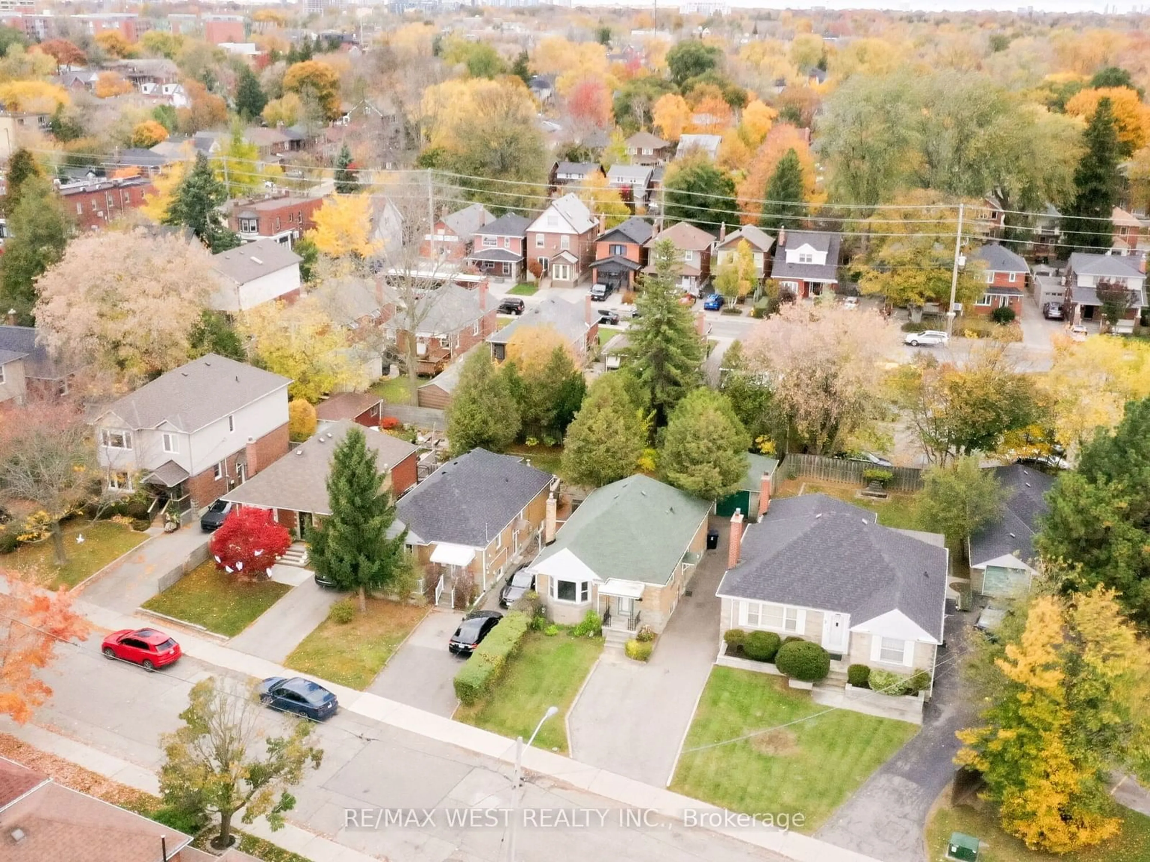 Frontside or backside of a home, the street view for 4 Allen Ave, Toronto Ontario M8V 1R8