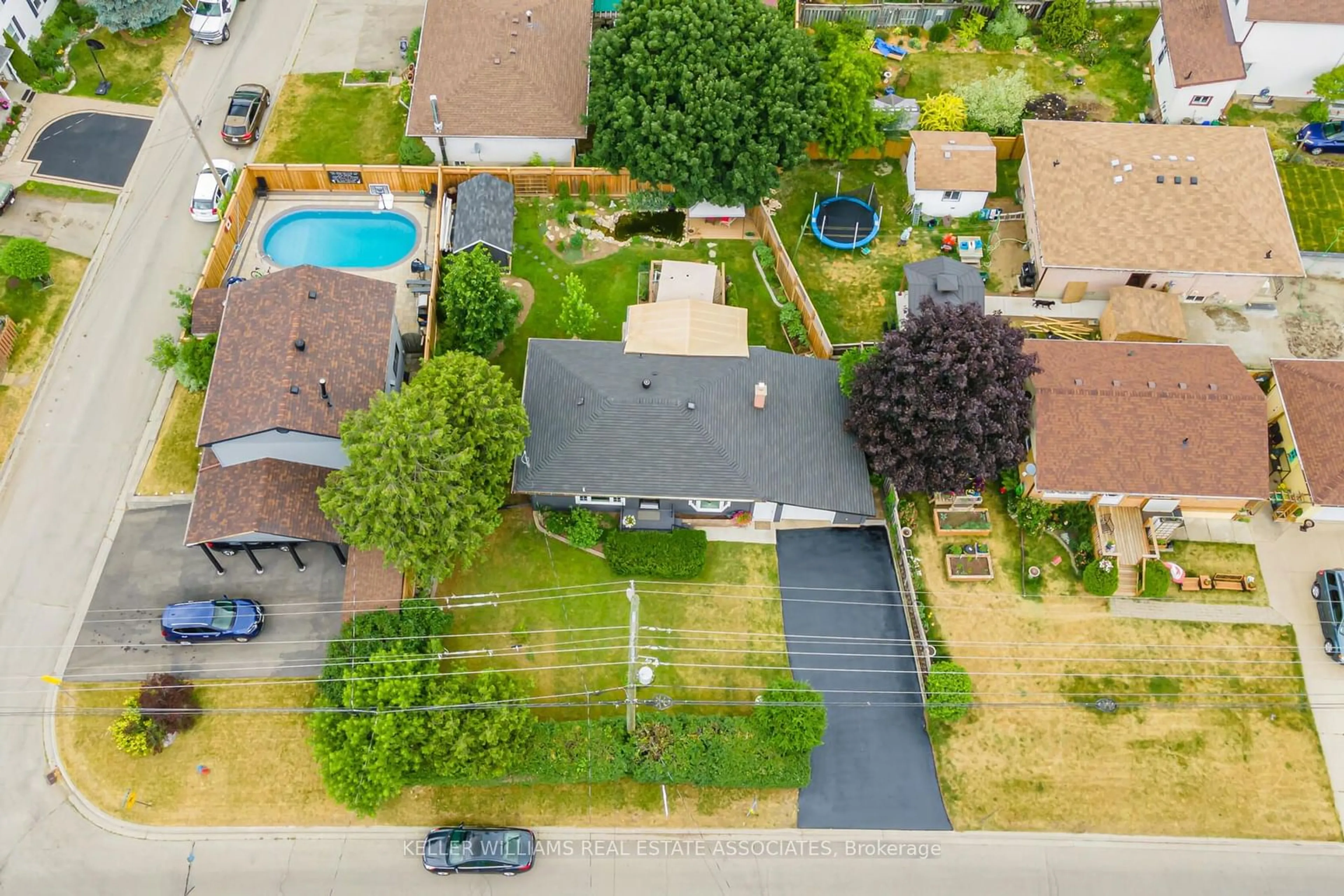 Frontside or backside of a home, the fenced backyard for 78 Ewing St, Halton Hills Ontario L7G 2R4