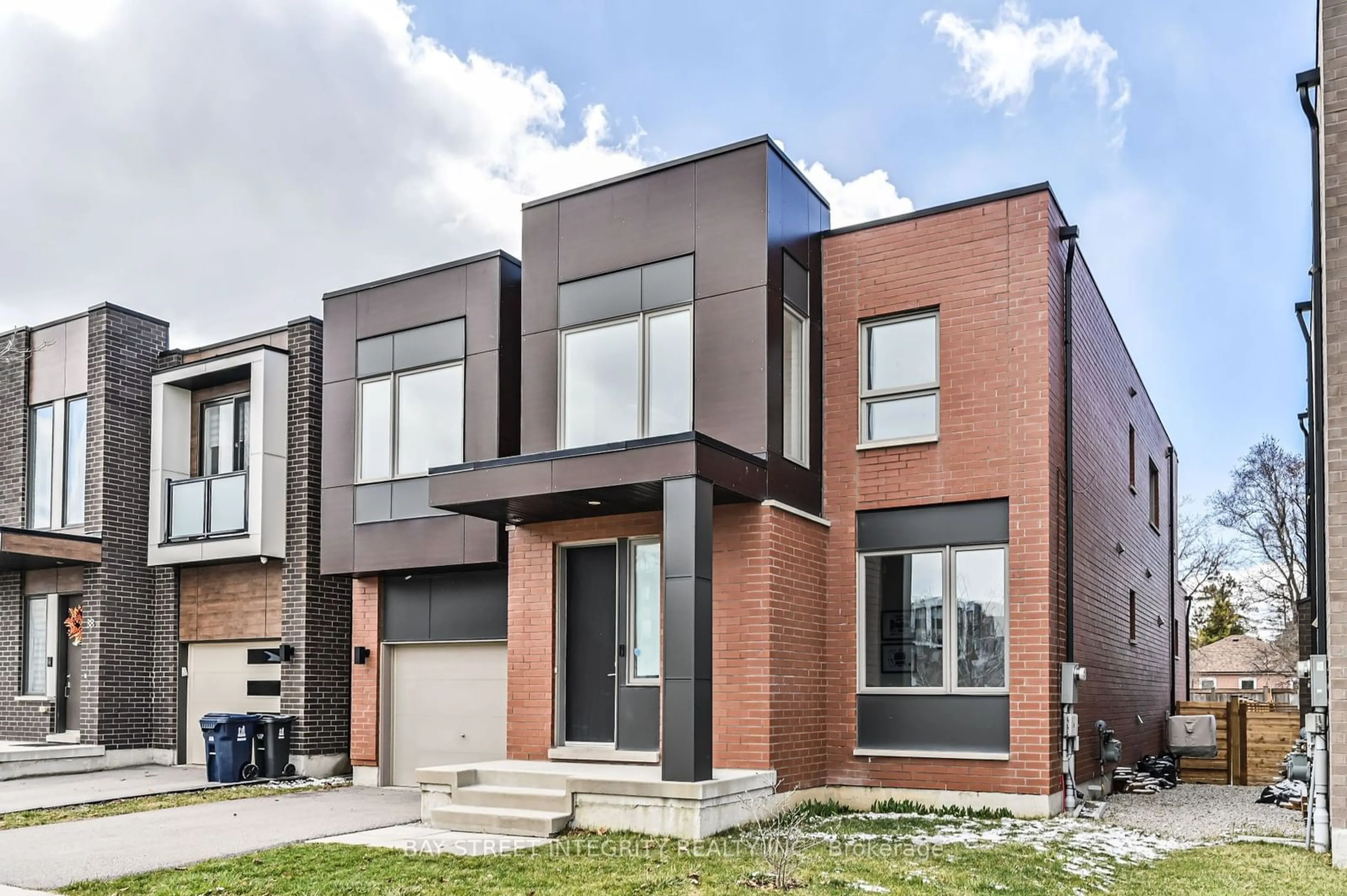 Home with brick exterior material for 40 Stanley Greene Blvd, Toronto Ontario M3K 0A9