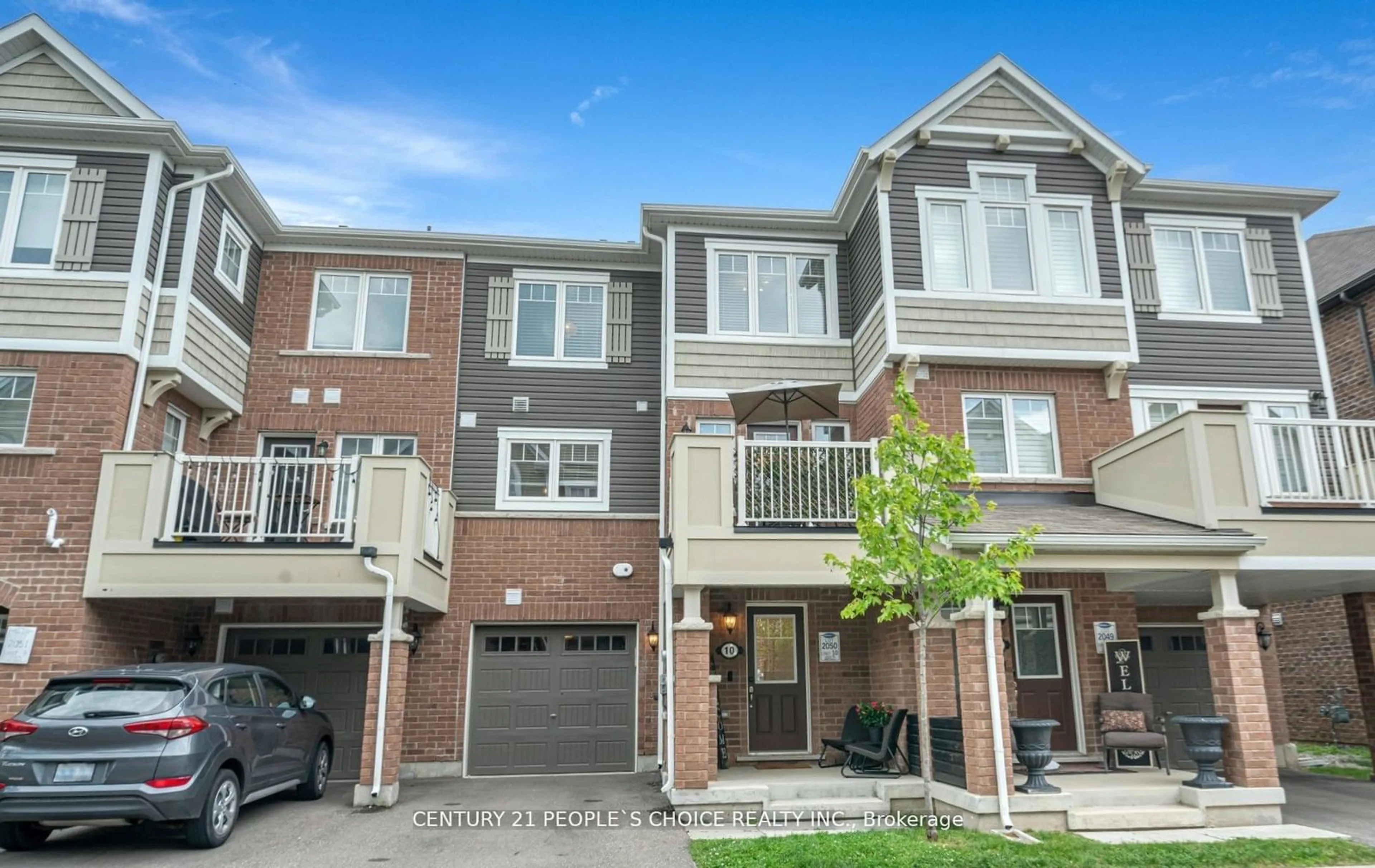 A pic from exterior of the house or condo, the street view for 1222 Rose Way #10, Milton Ontario L9E 1P1