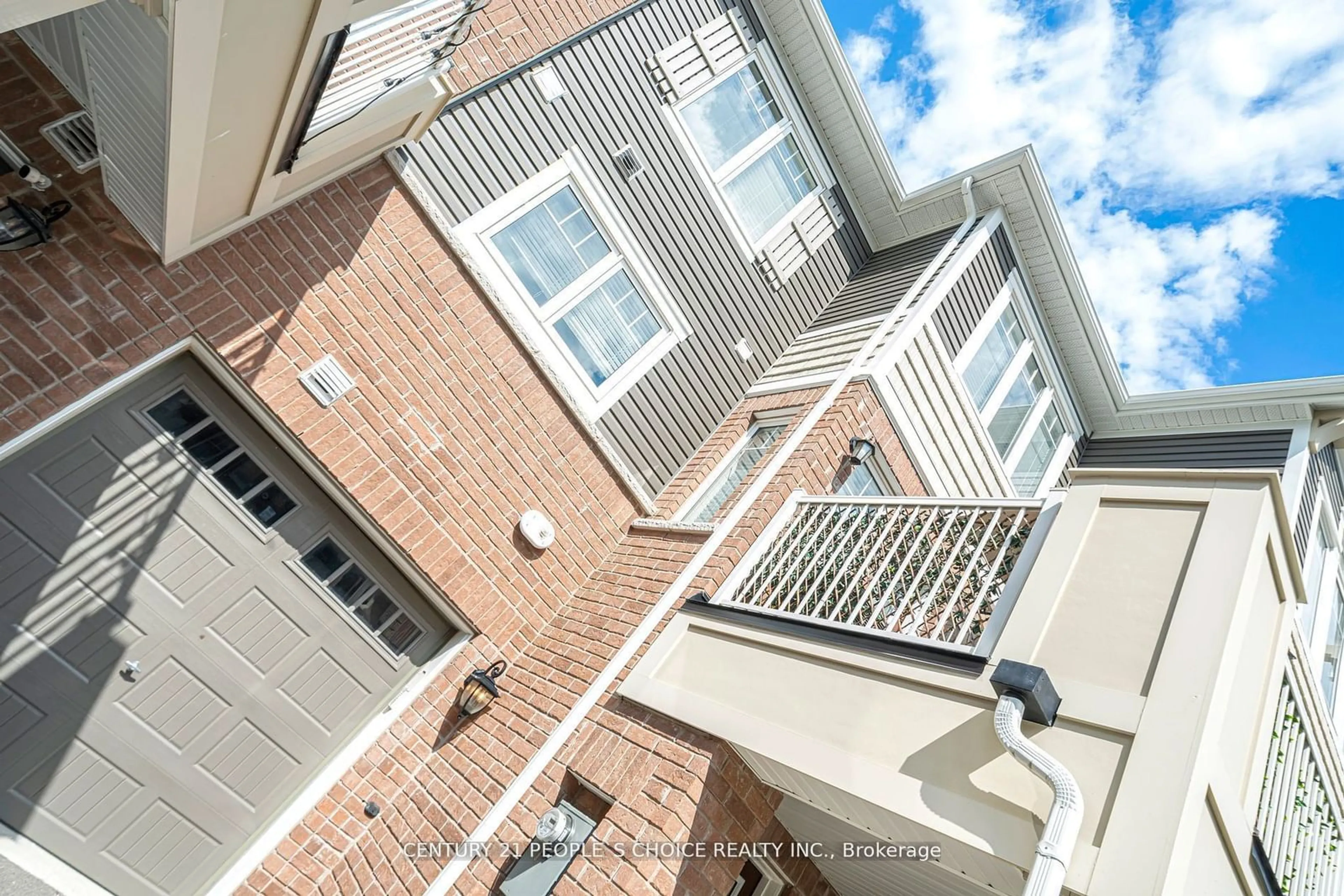 A pic from exterior of the house or condo, the street view for 1222 Rose Way #10, Milton Ontario L9E 1P1