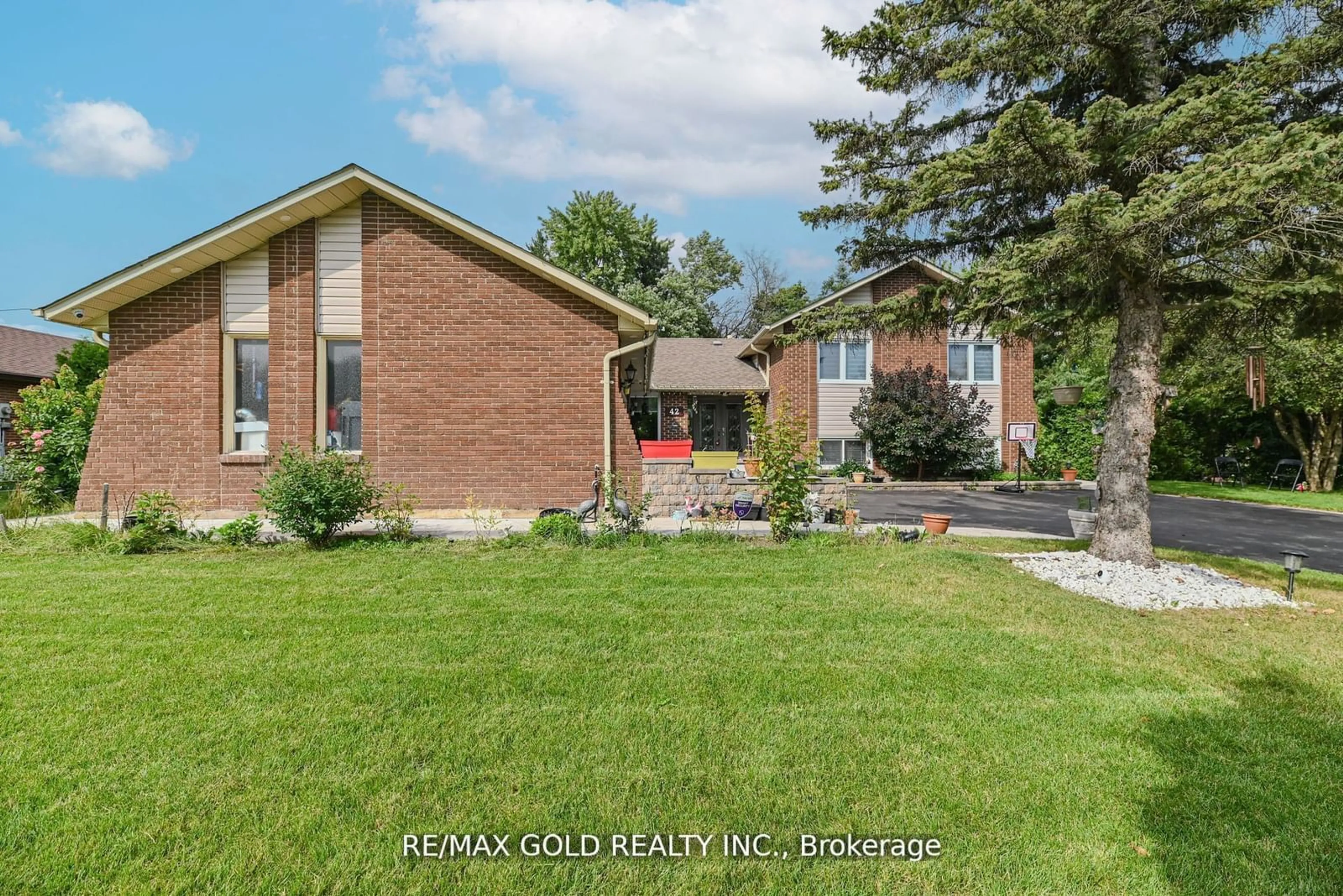 Frontside or backside of a home, the fenced backyard for 42 Boreham Circ, Brampton Ontario L6Z 1T4