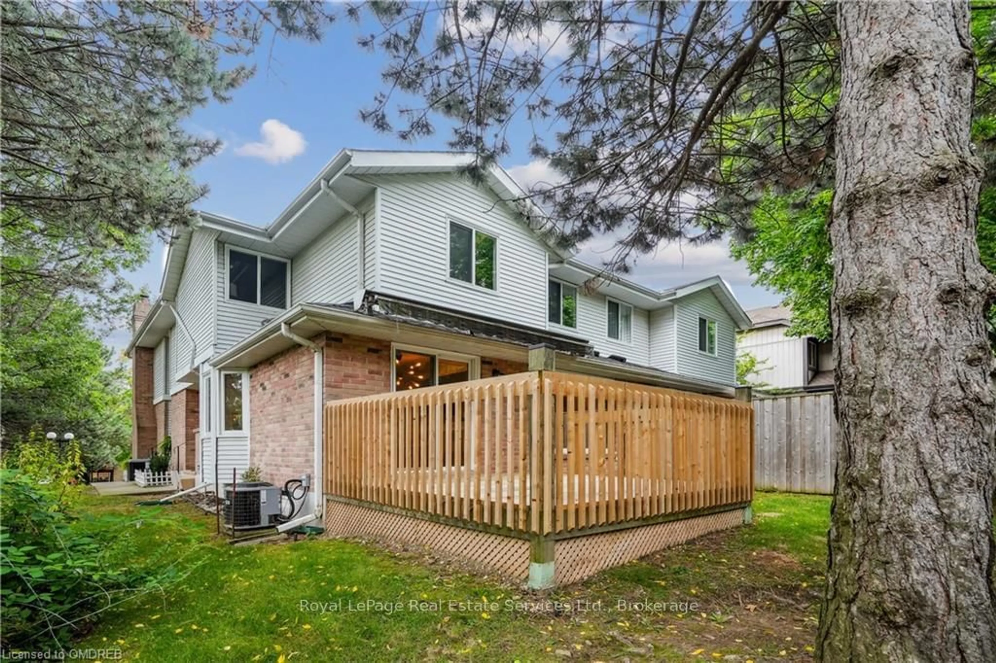 A pic from exterior of the house or condo, the fenced backyard for 1513 UPPER MIDDLE Rd #3, Burlington Ontario L7P 4M5