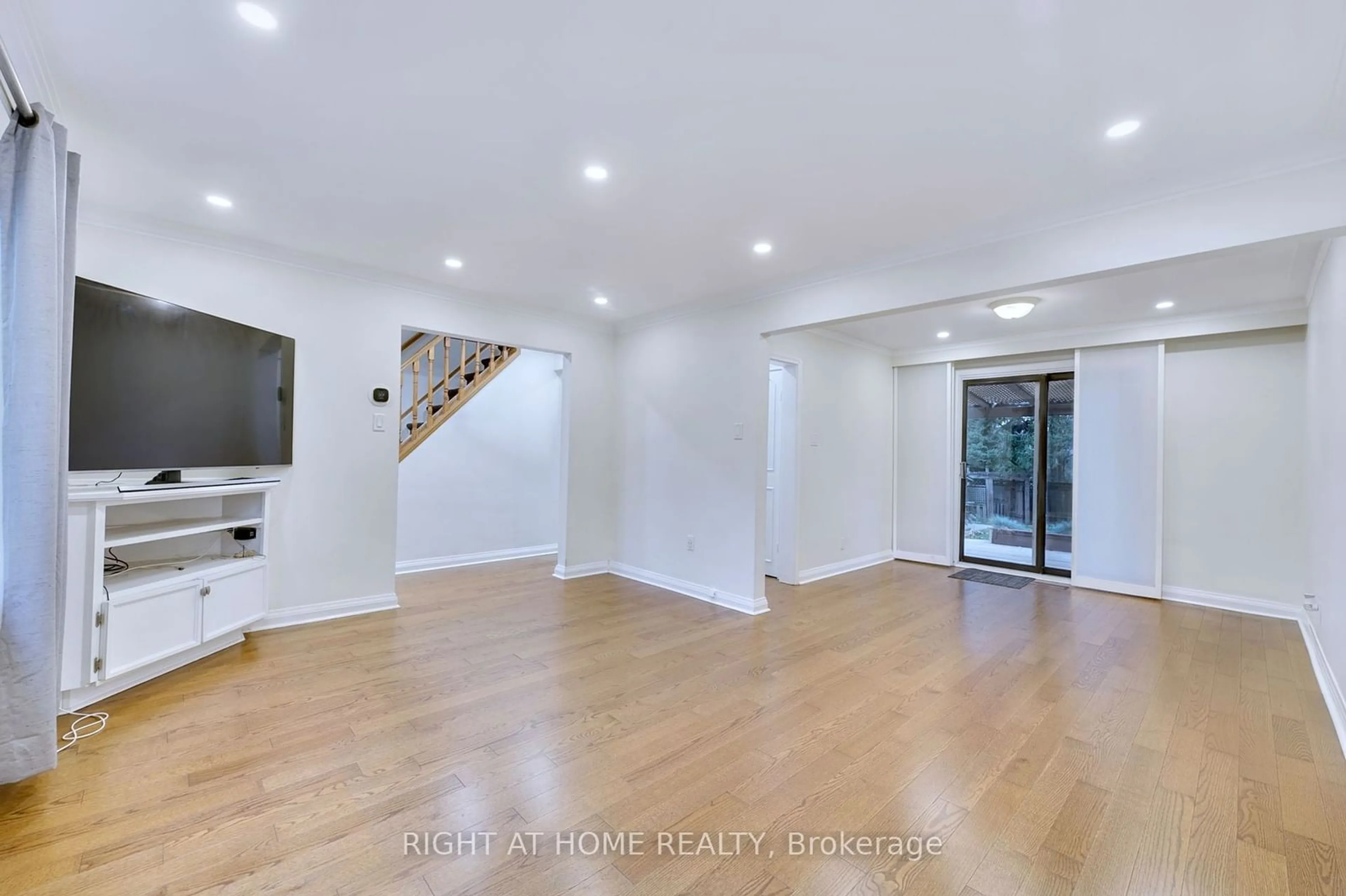 A pic of a room, wood floors for 6 Adele Ave, Toronto Ontario M3L 1J1