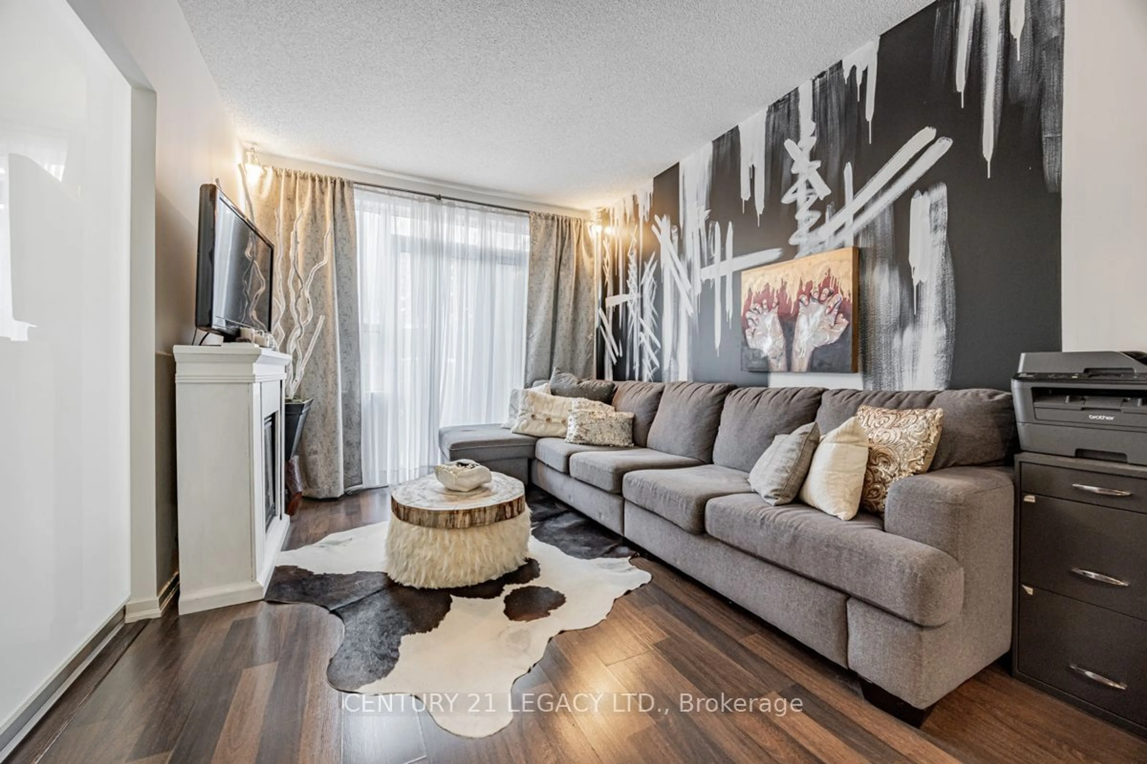 Living room, wood floors for 38 Joe Shuster Way #106, Toronto Ontario M6K 0A4