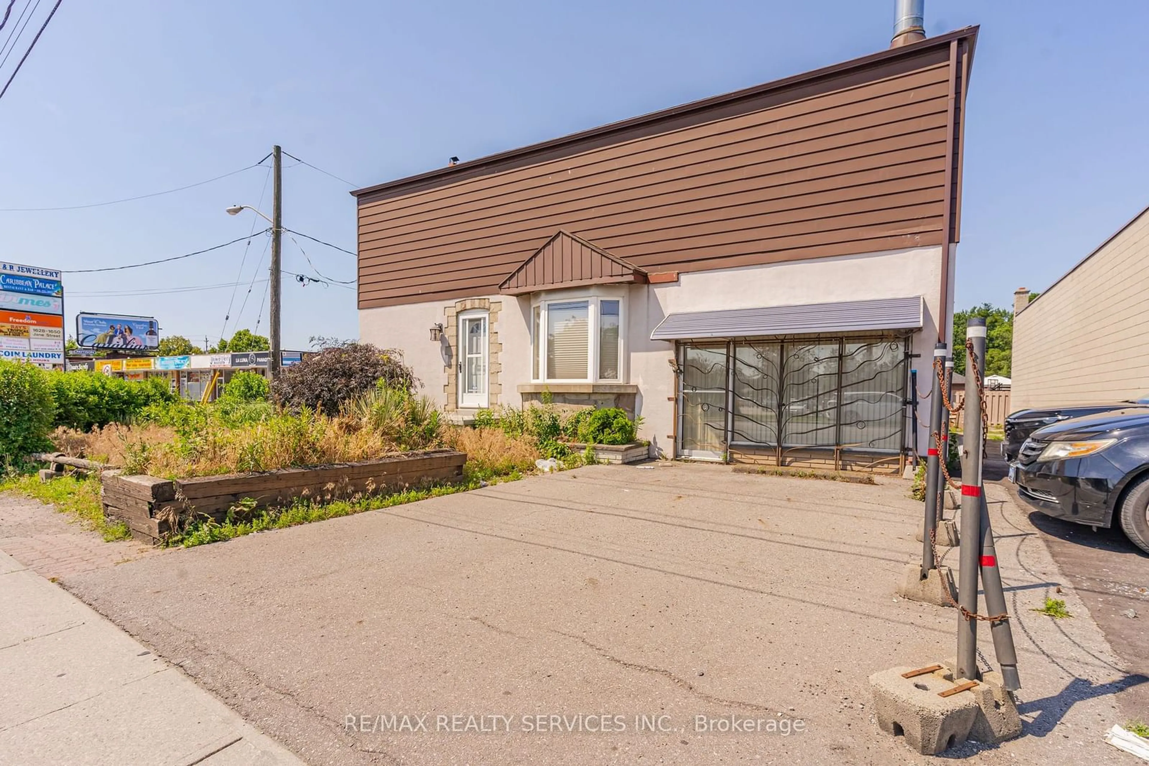 Frontside or backside of a home, the street view for 1652 Jane St, Toronto Ontario M9N 2S1