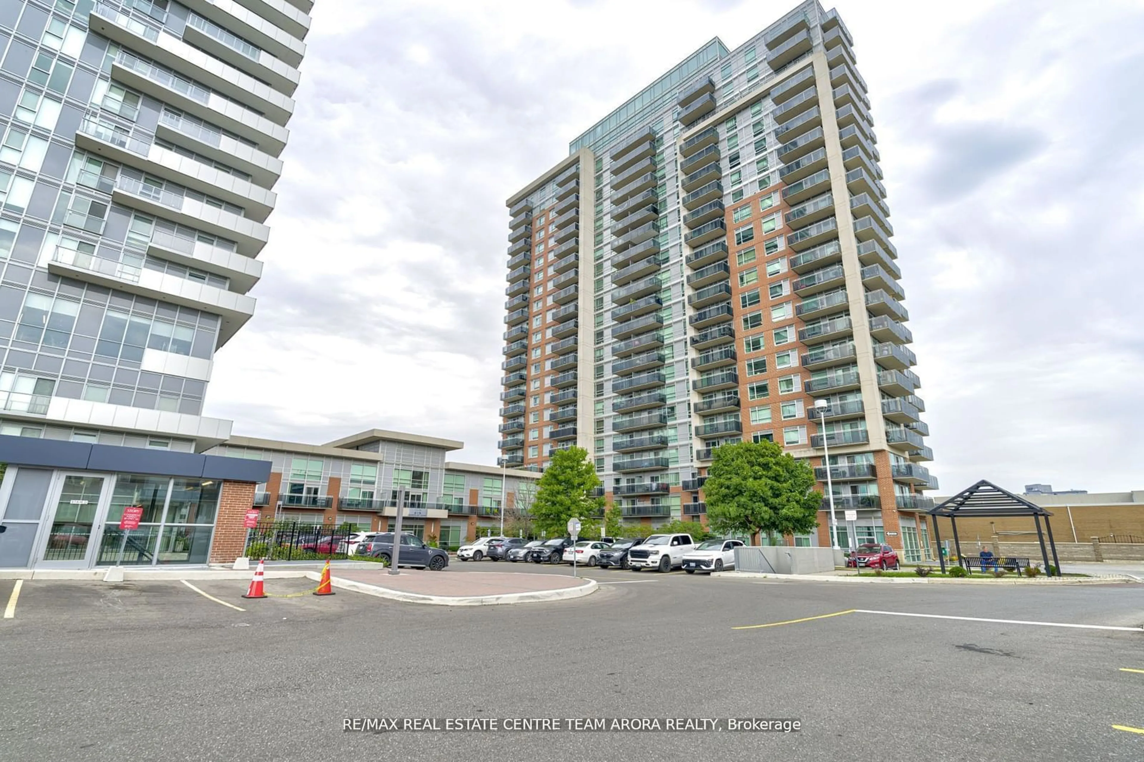 A pic from exterior of the house or condo, the street view for 215 Queen St #1103, Brampton Ontario L6W 0A9