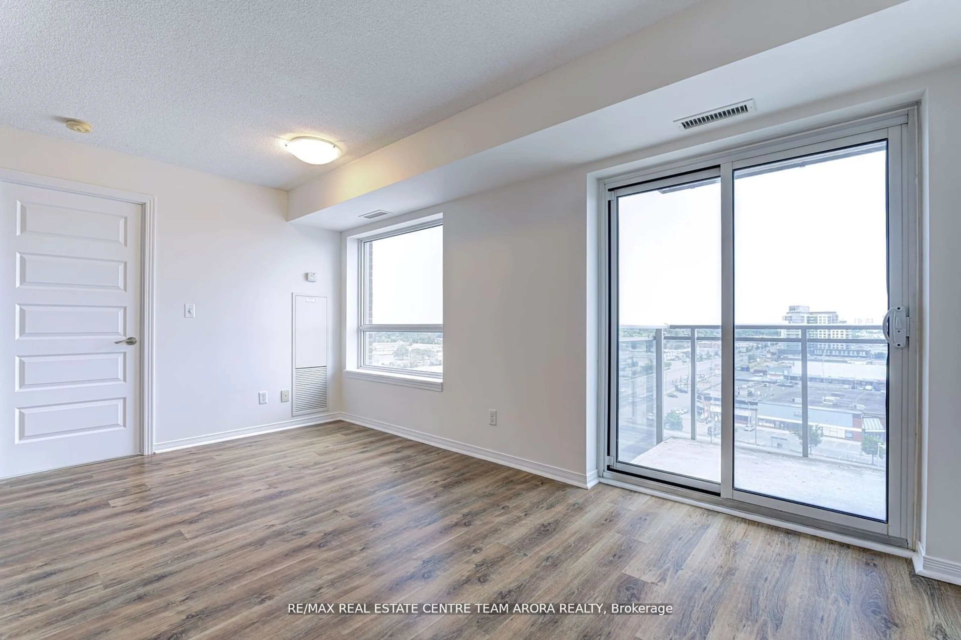 A pic of a room, wood floors for 215 Queen St #1103, Brampton Ontario L6W 0A9