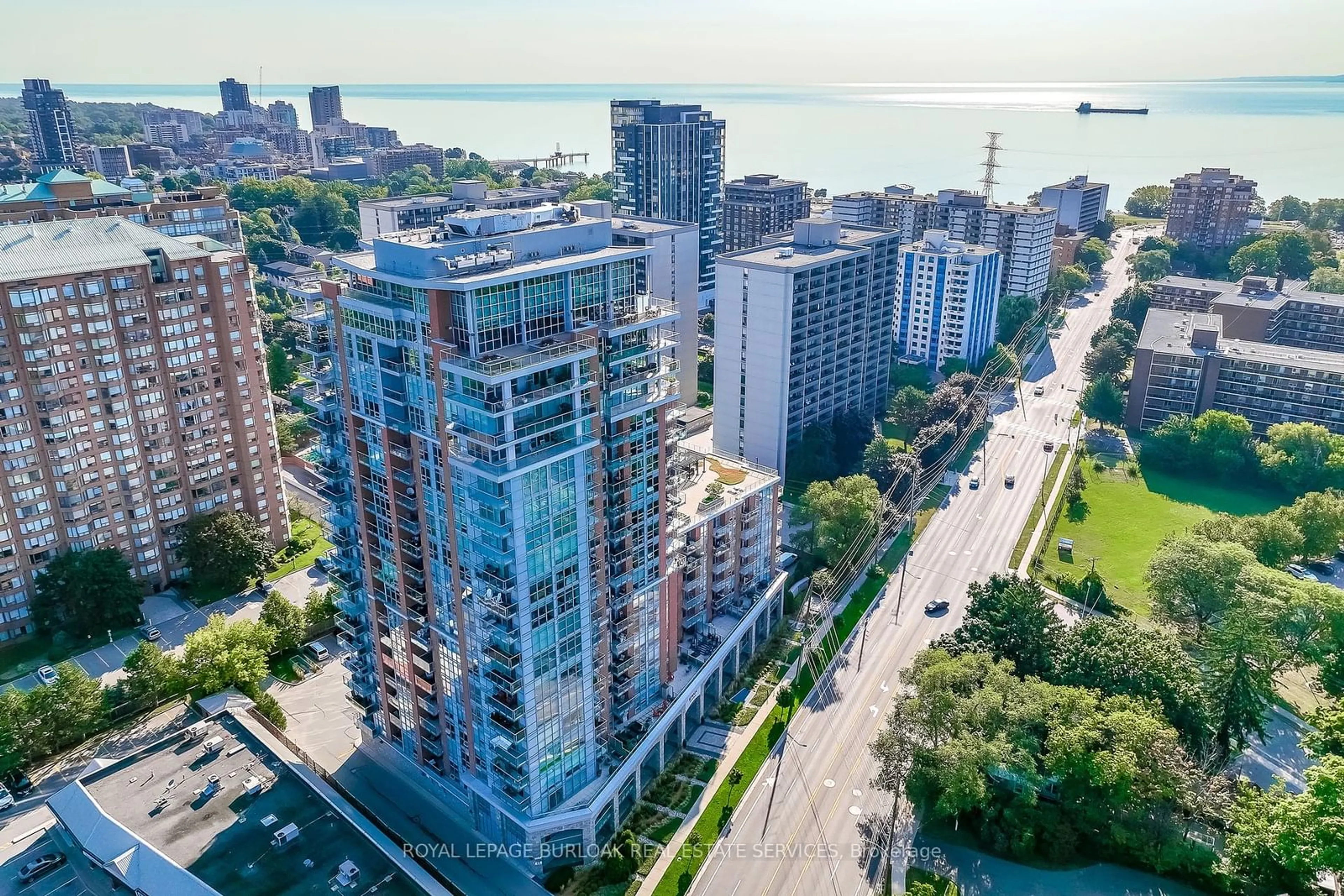 A pic from exterior of the house or condo, the view of city buildings for 551 Maple Ave #1202, Burlington Ontario L7S 1M7