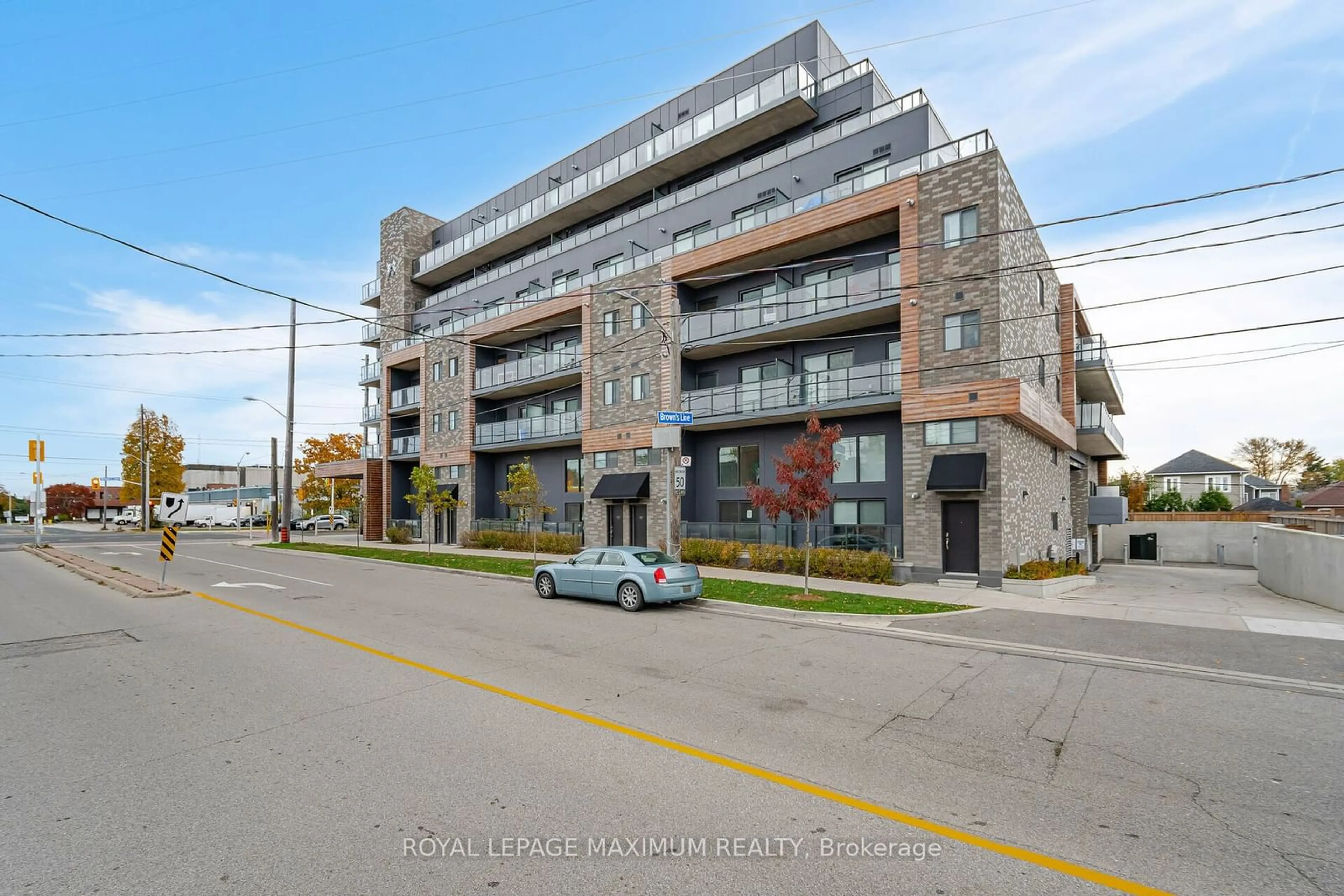 A pic from exterior of the house or condo, the street view for 408 Browns Line #308, Toronto Ontario M9W 3T9