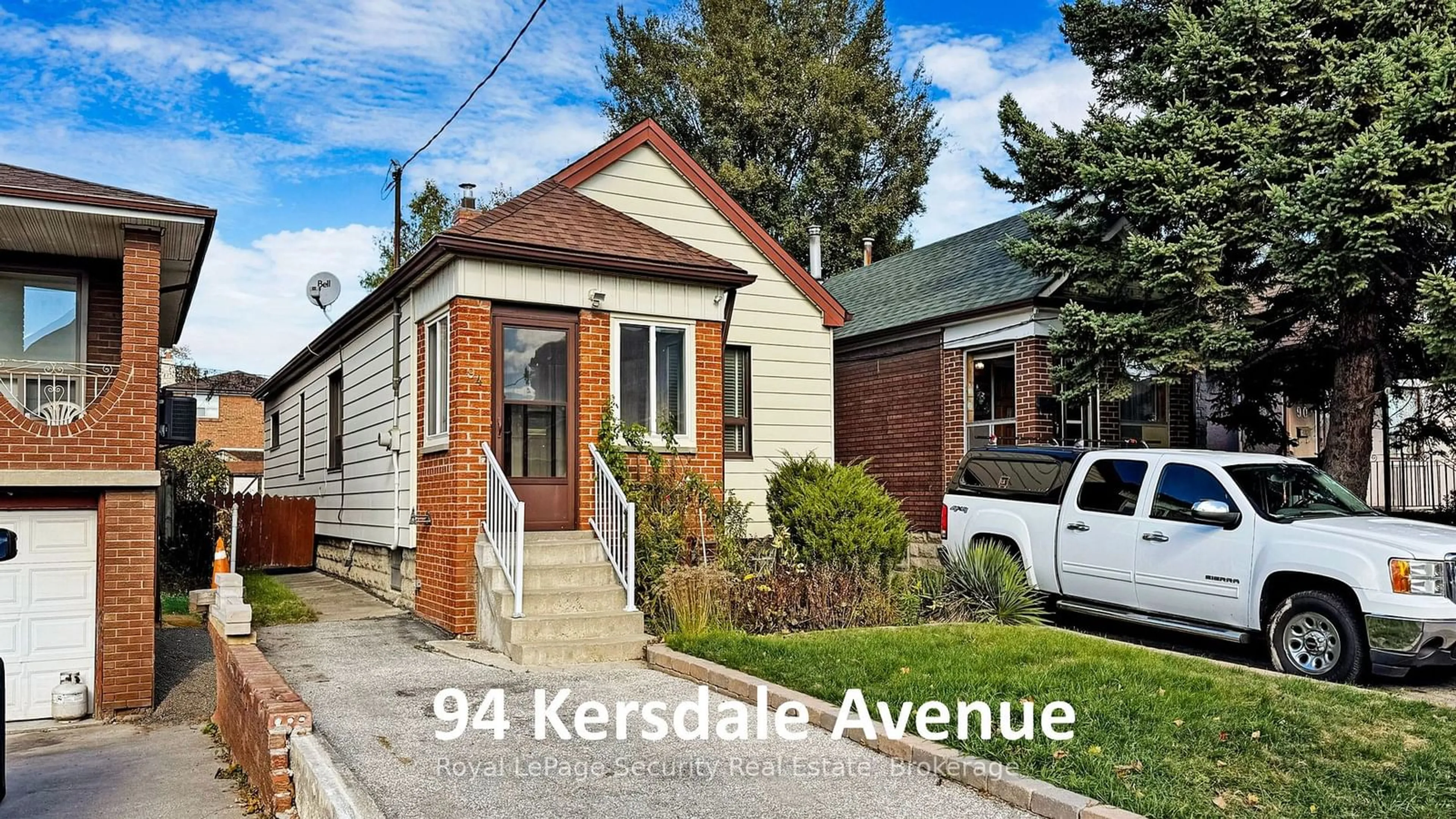 Frontside or backside of a home, the street view for 94 Kersdale Ave, Toronto Ontario M6M 1E3