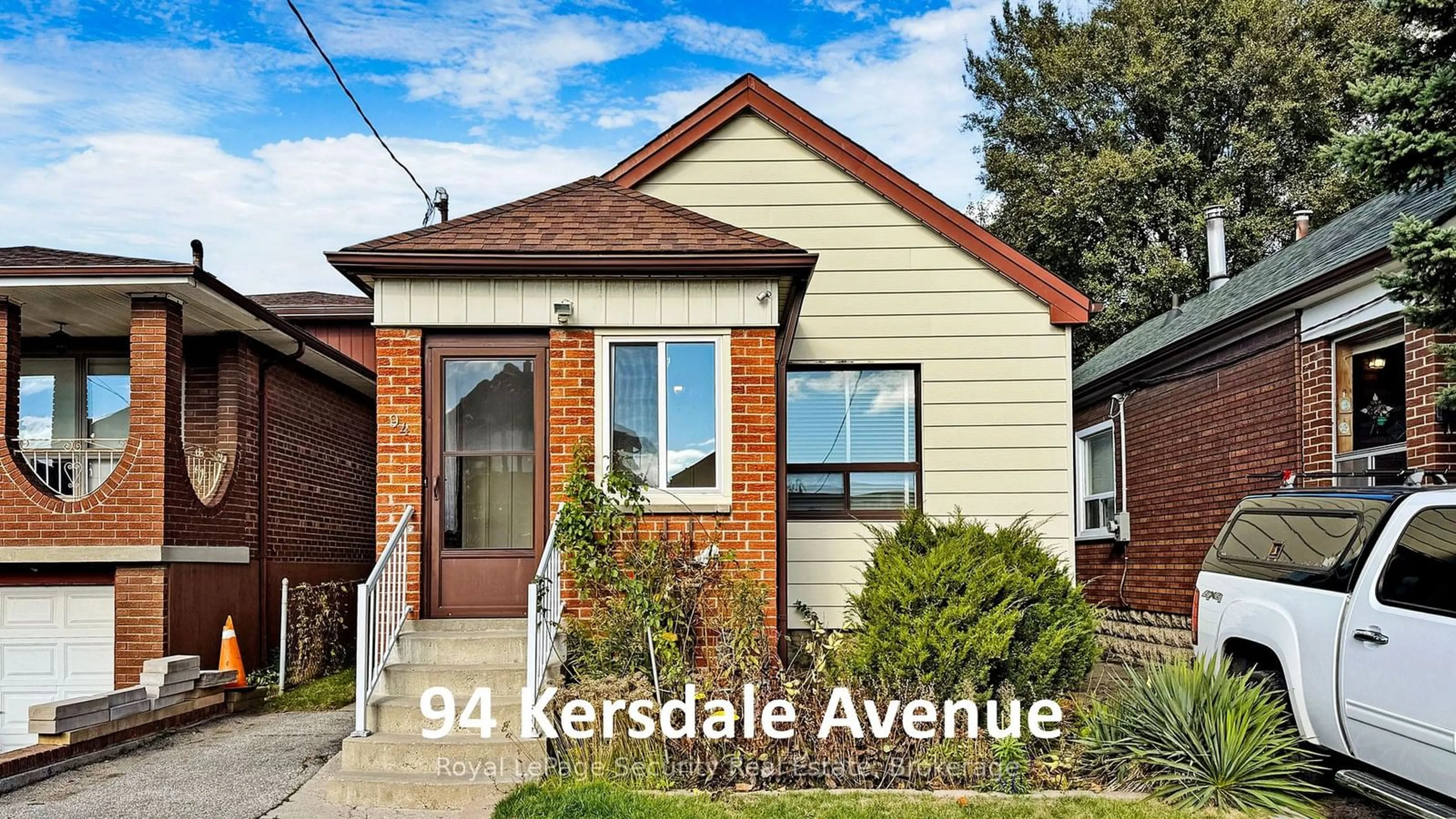 Frontside or backside of a home, the street view for 94 Kersdale Ave, Toronto Ontario M6M 1E3