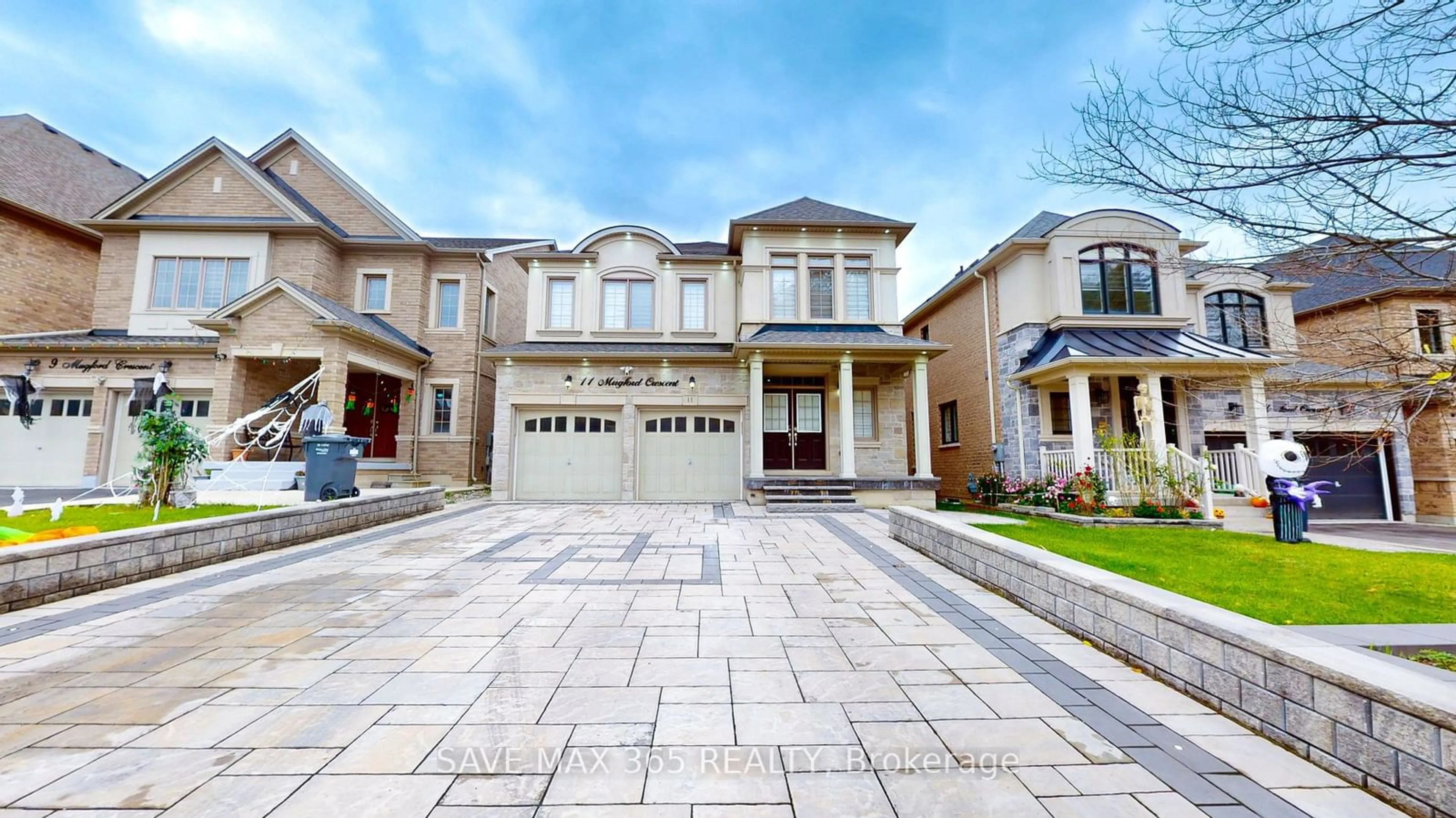 Frontside or backside of a home, the street view for 11 Mugford Cres, Brampton Ontario L6Y 6A7